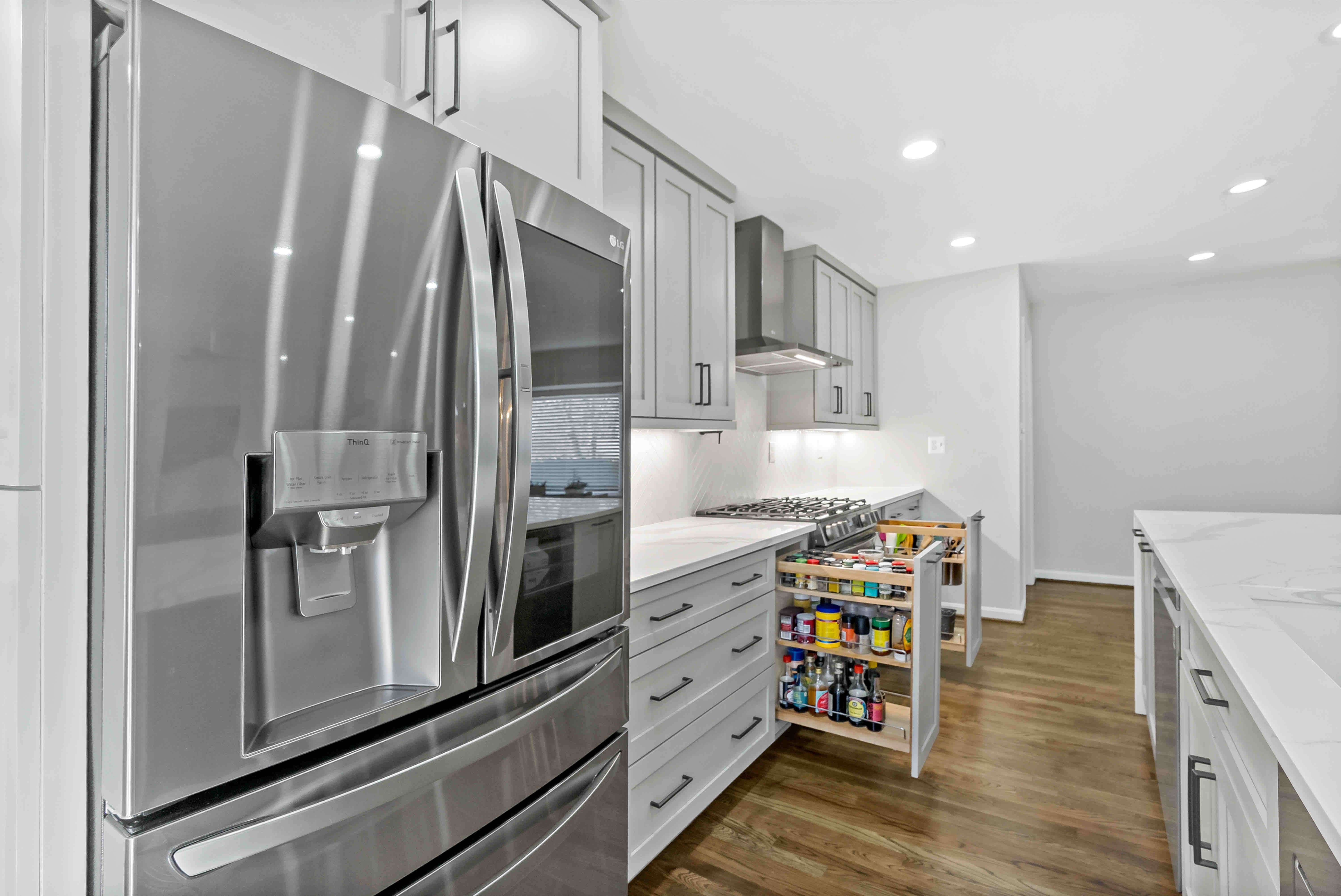 Drawer organization for spices near stove in kitchen