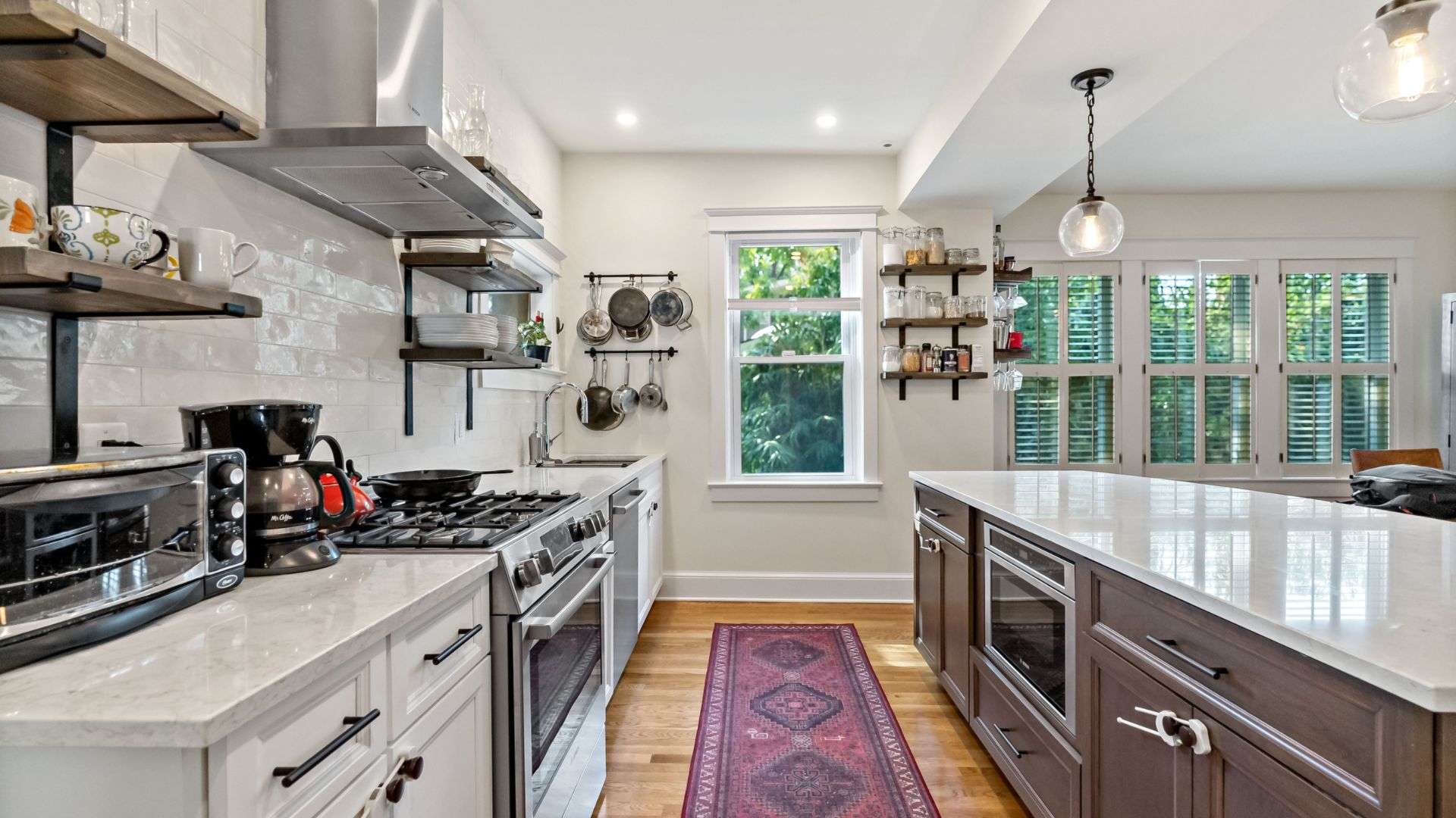 Hard wood floor kitchen with white countertops