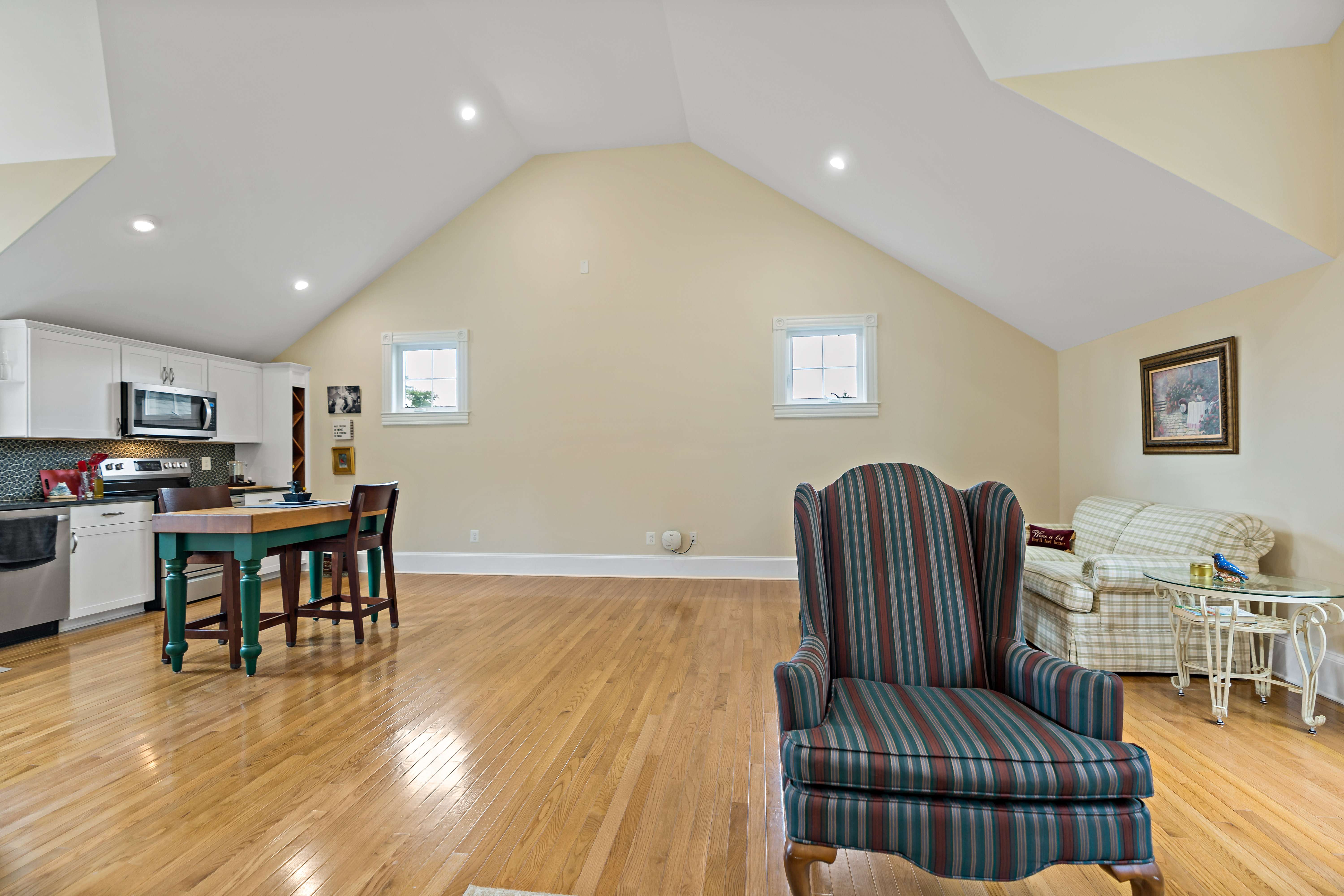 Cathedral ceiling and hard wood floors in sitting area