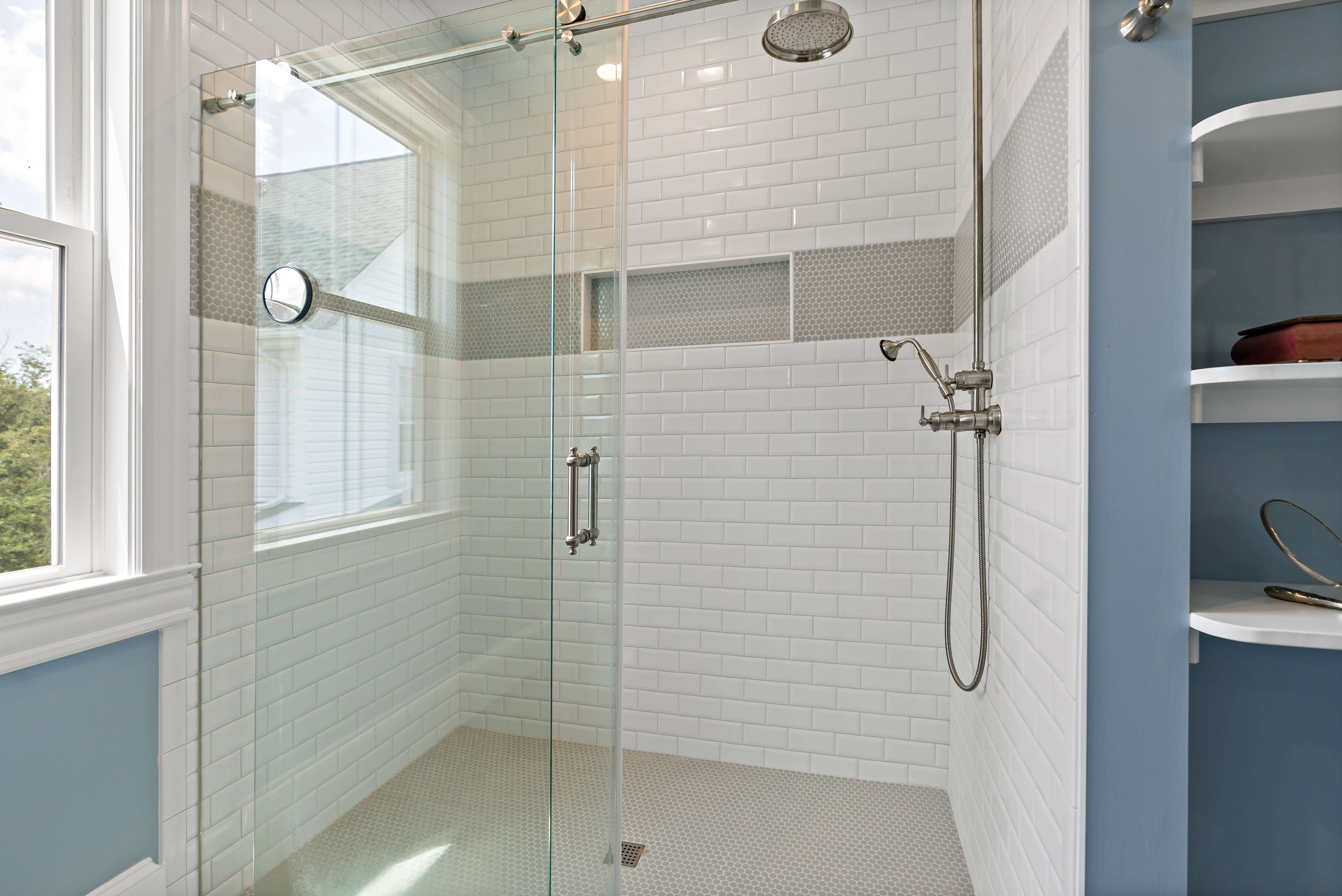 White tile shower and glass walls in Fairfax home