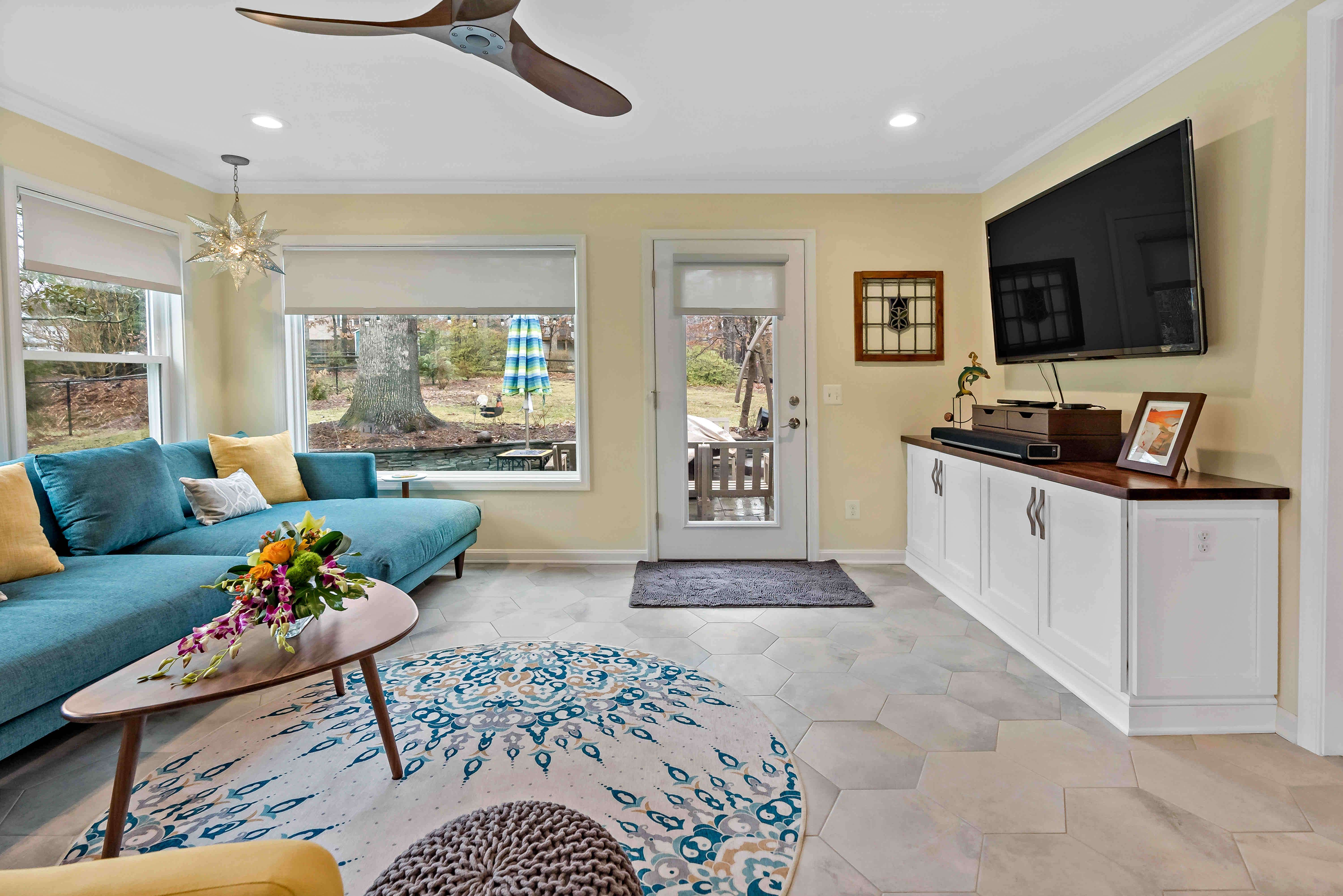 Living room with access to backyard patio