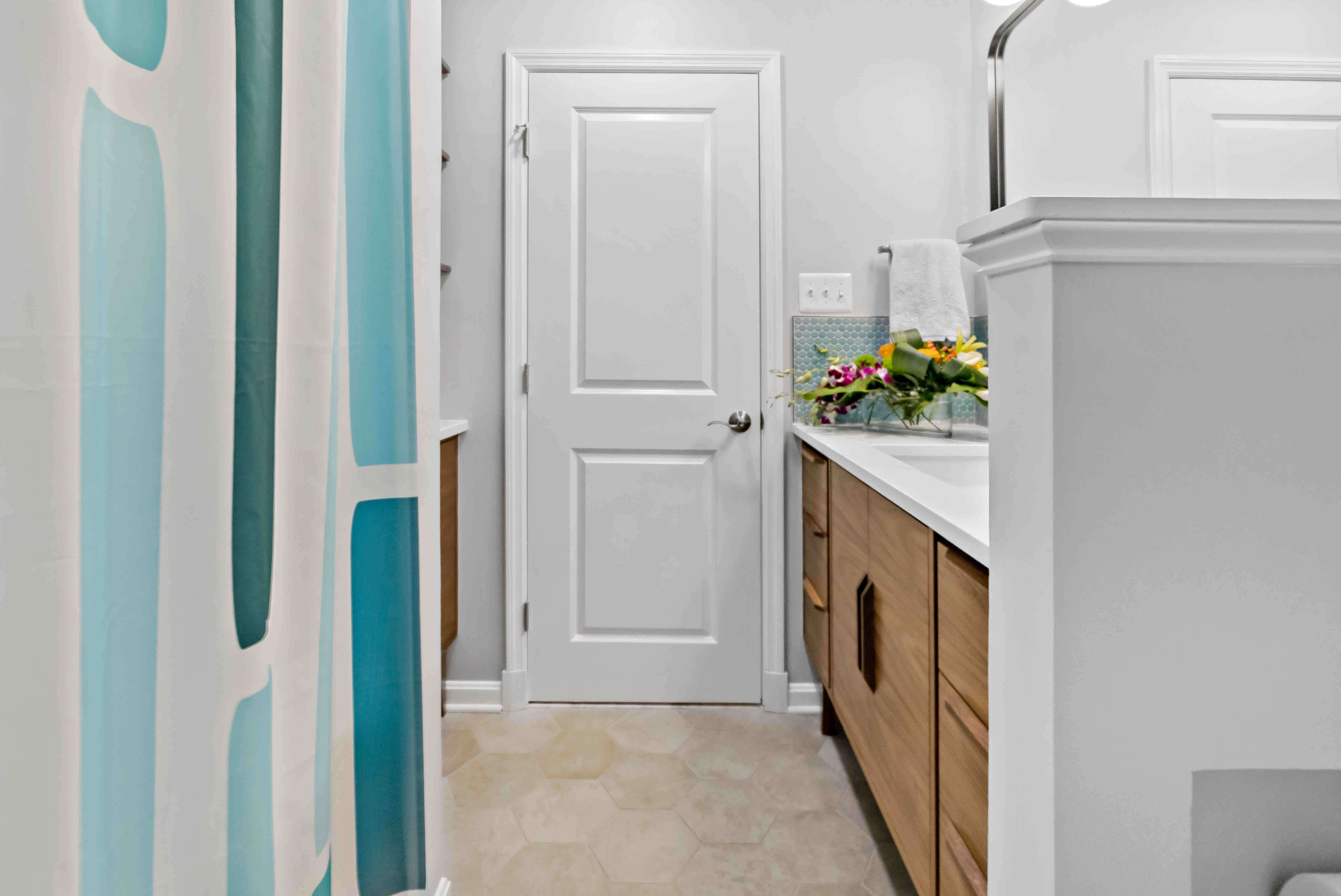 White bathroom with show tub combo