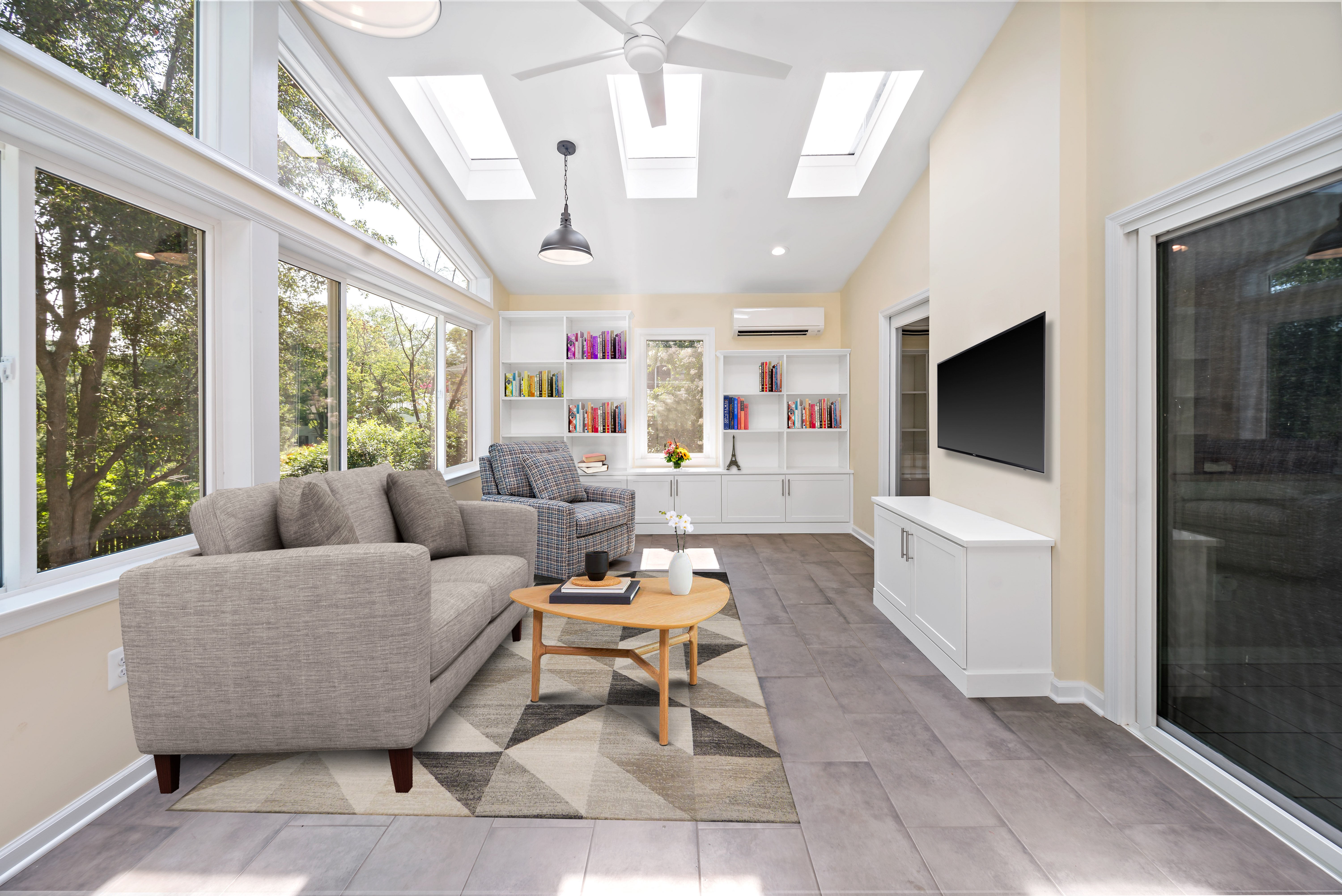 Grey tile floor in four season sunroom