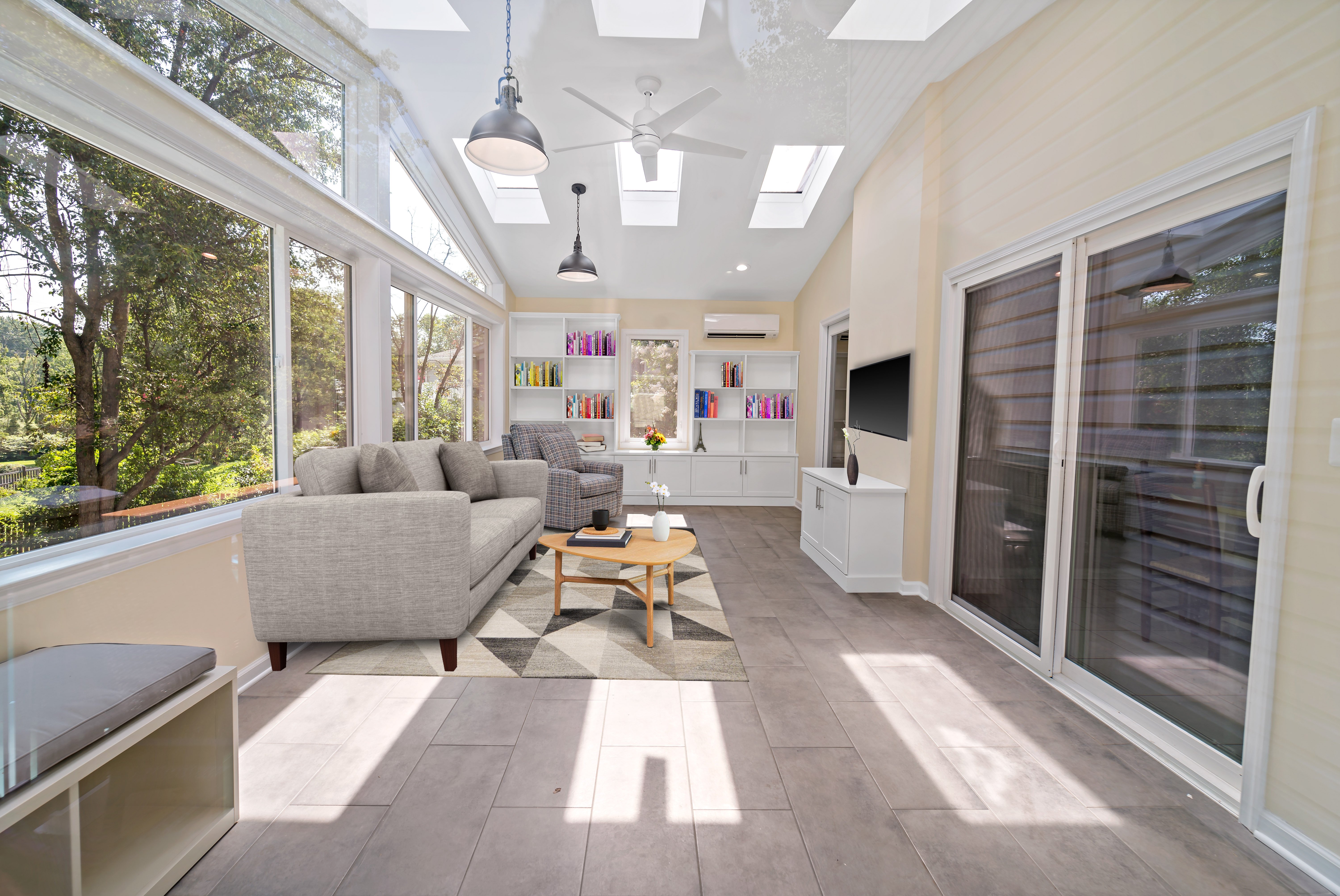 Four season sunroom with multiple skylights