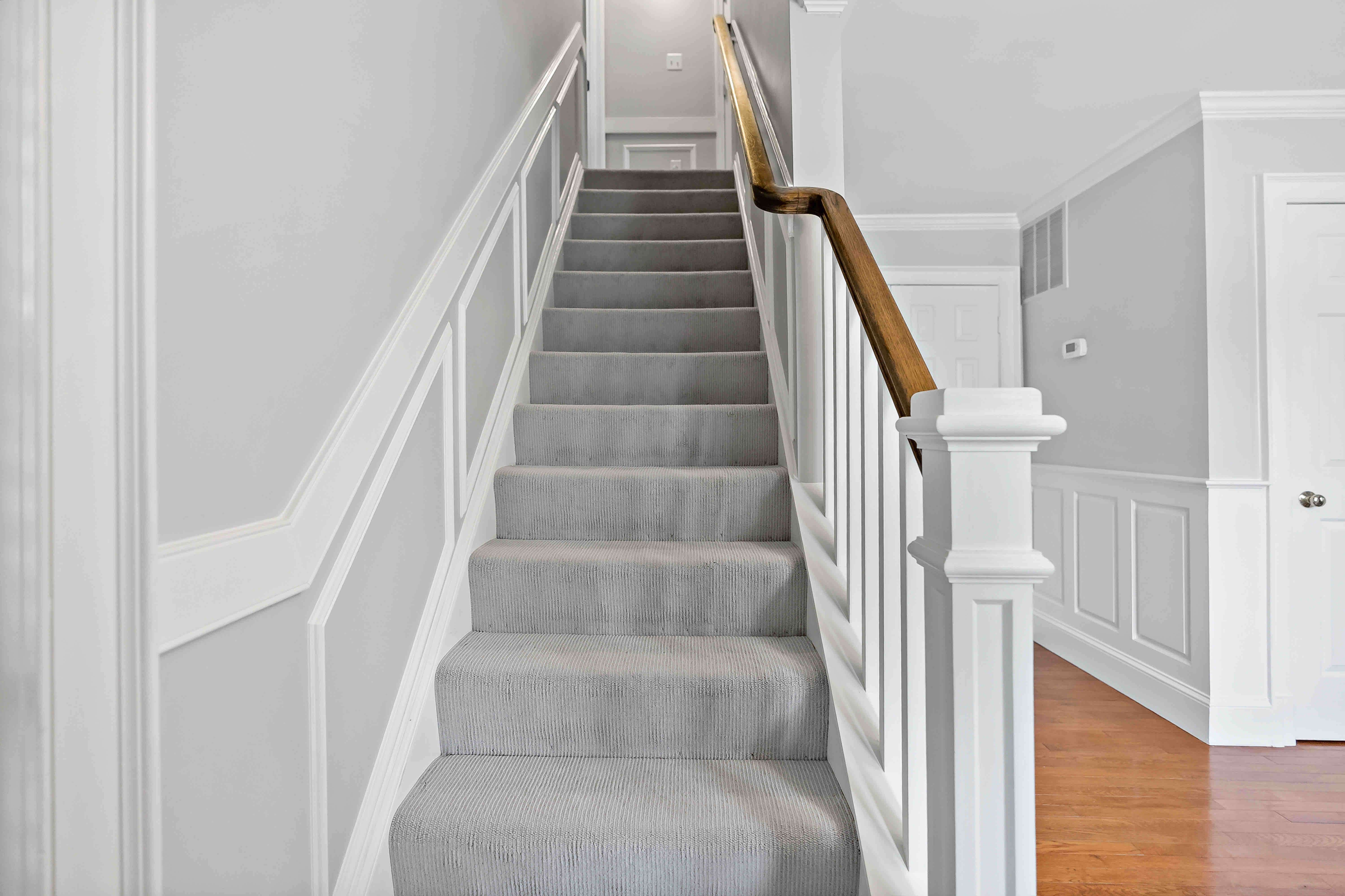 White and brown railing on staircase