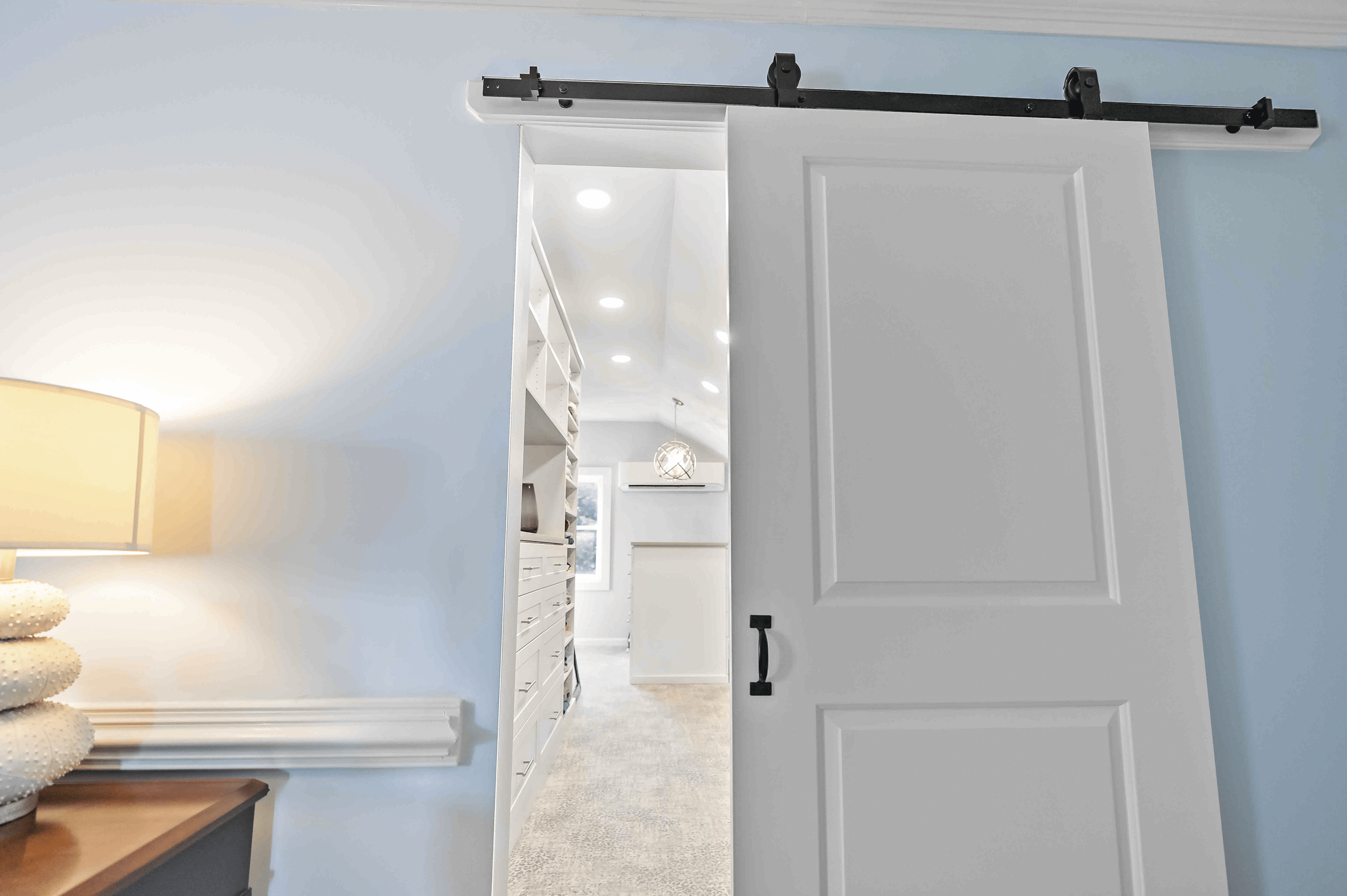 Sliding barn door to enter walk-in closet