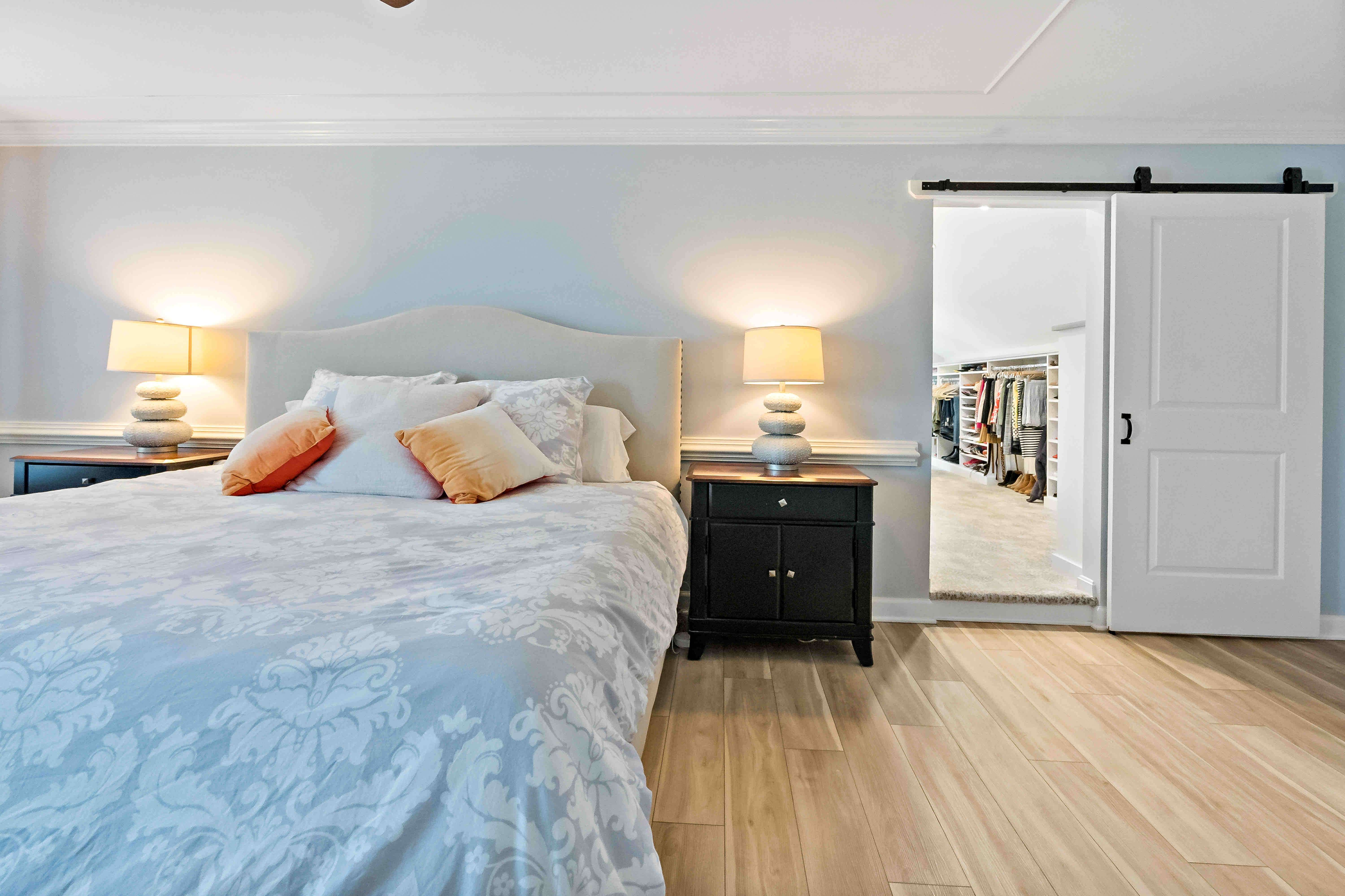 Bedroom with sliding barn door