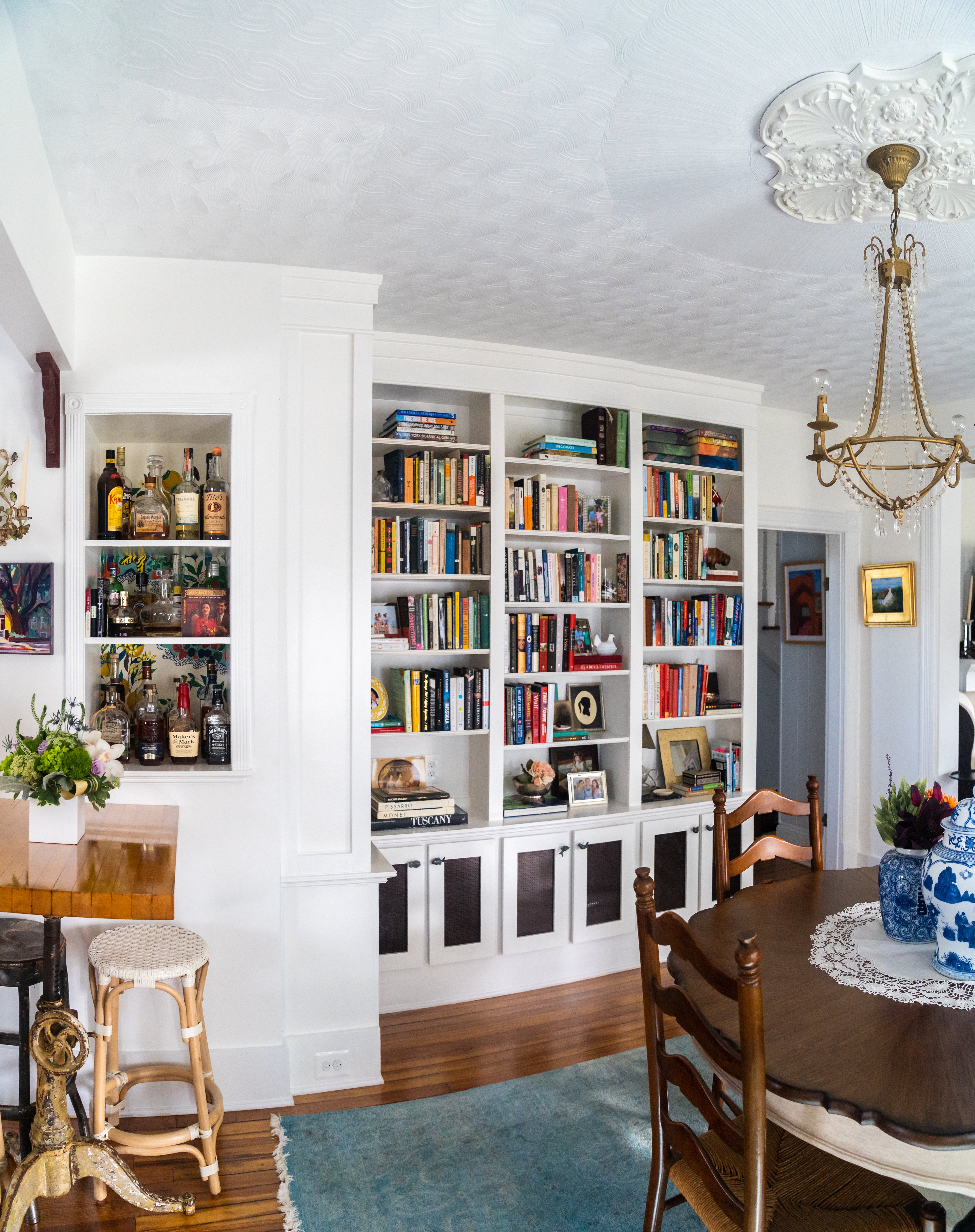 White wall with built-in book shelves