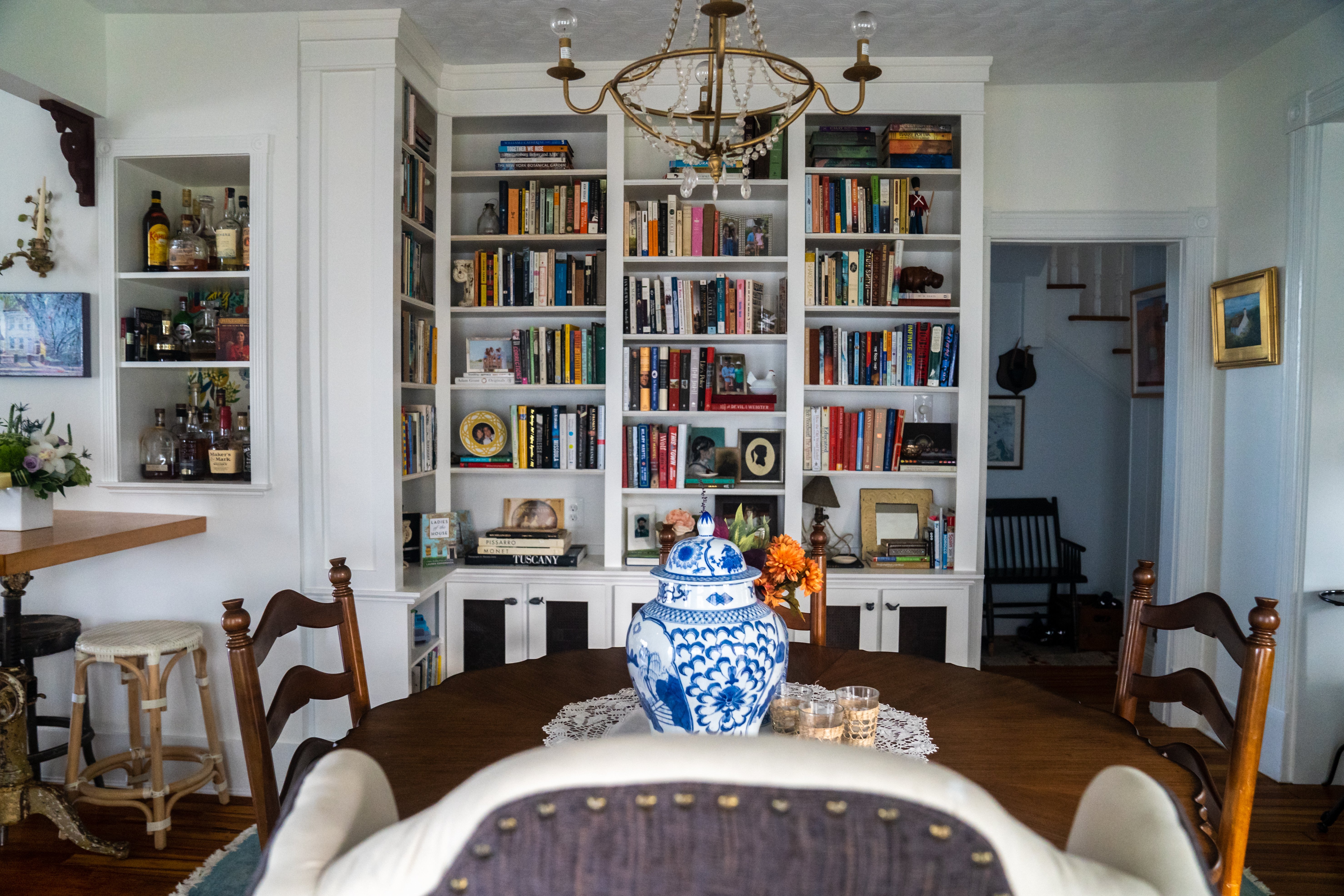 Book shelves built-in to entire wall