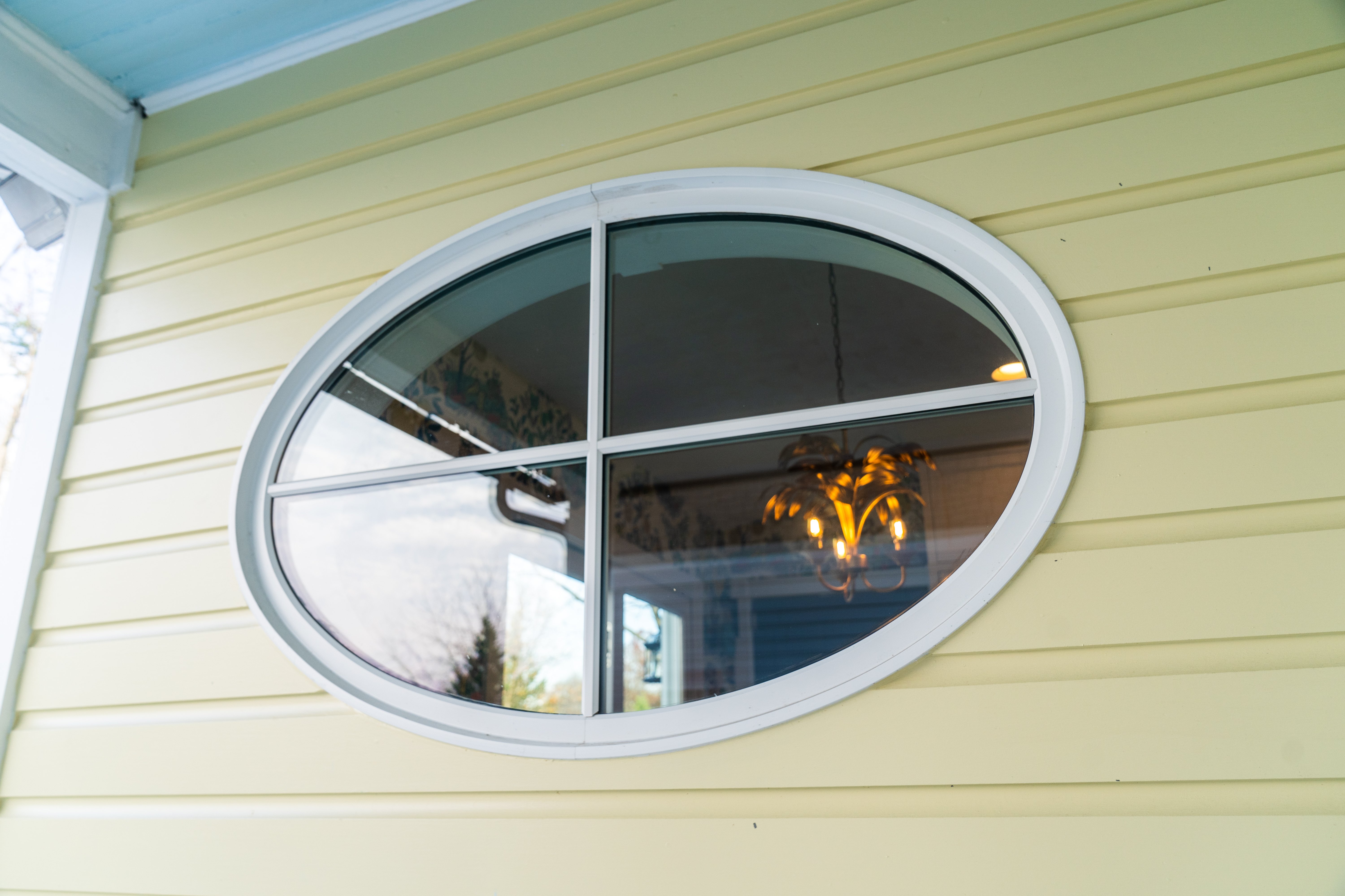 Oval window with panels