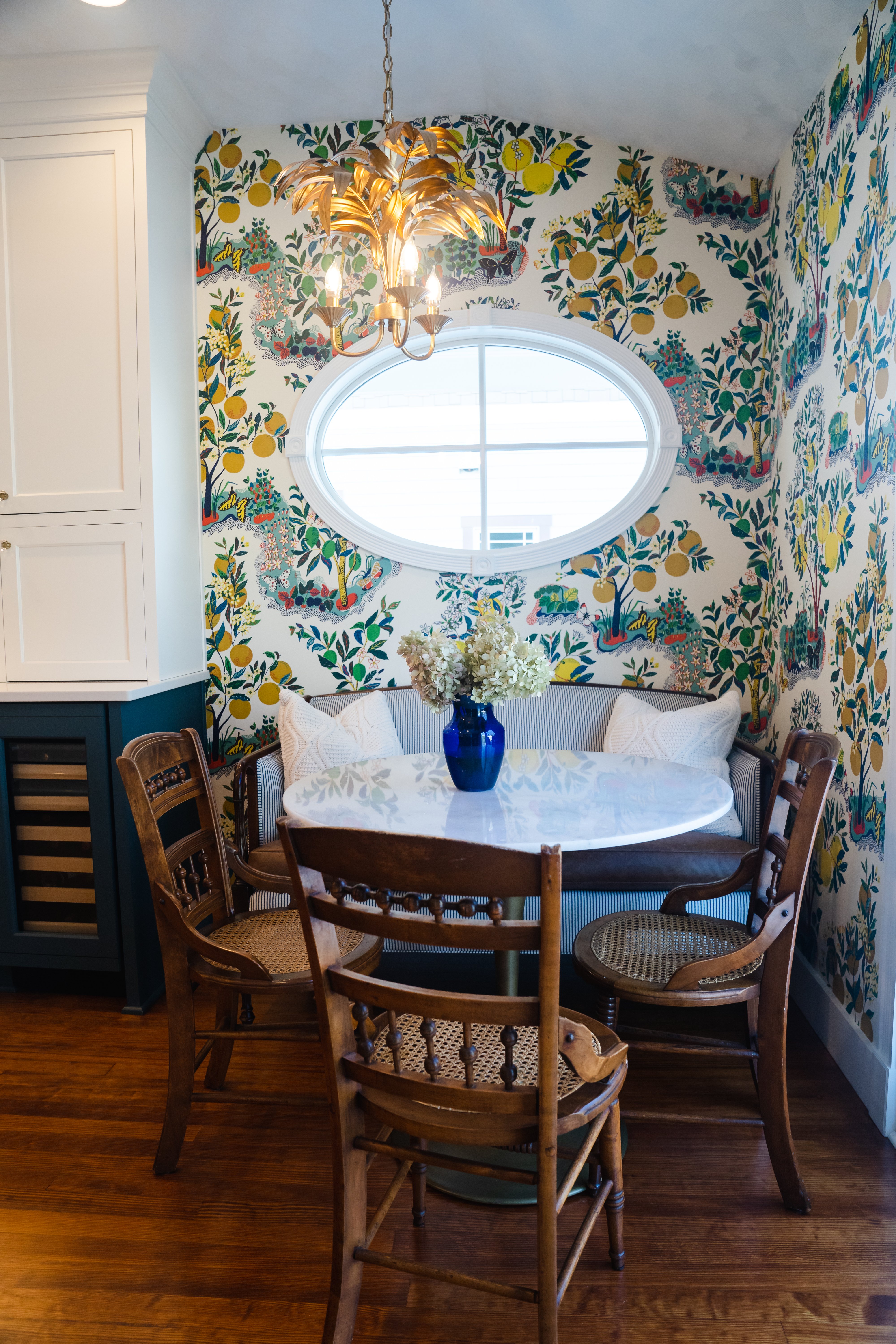 Green wallpaper in dining room