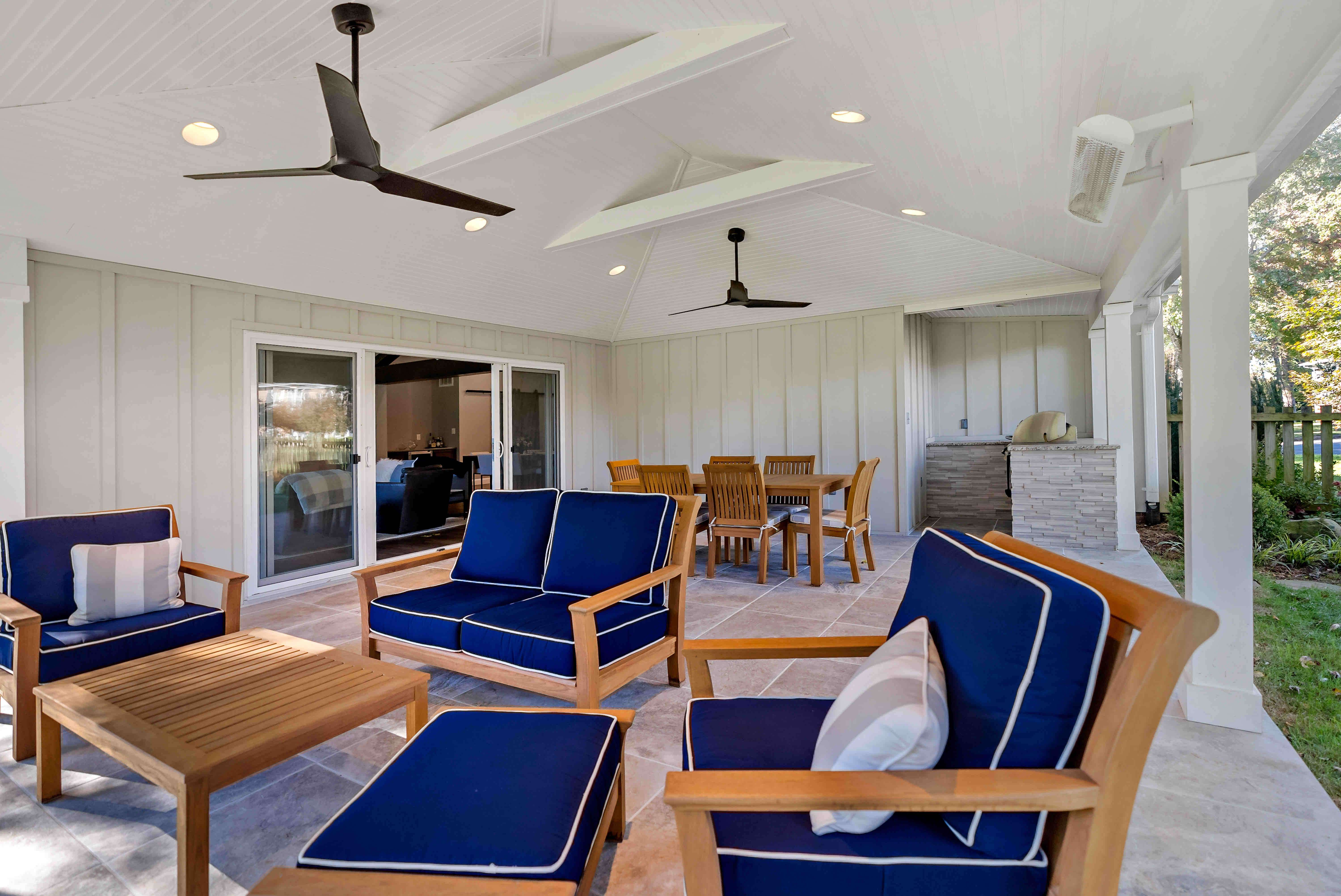 Outdoor patio with cathedral ceiling and ceiling fans