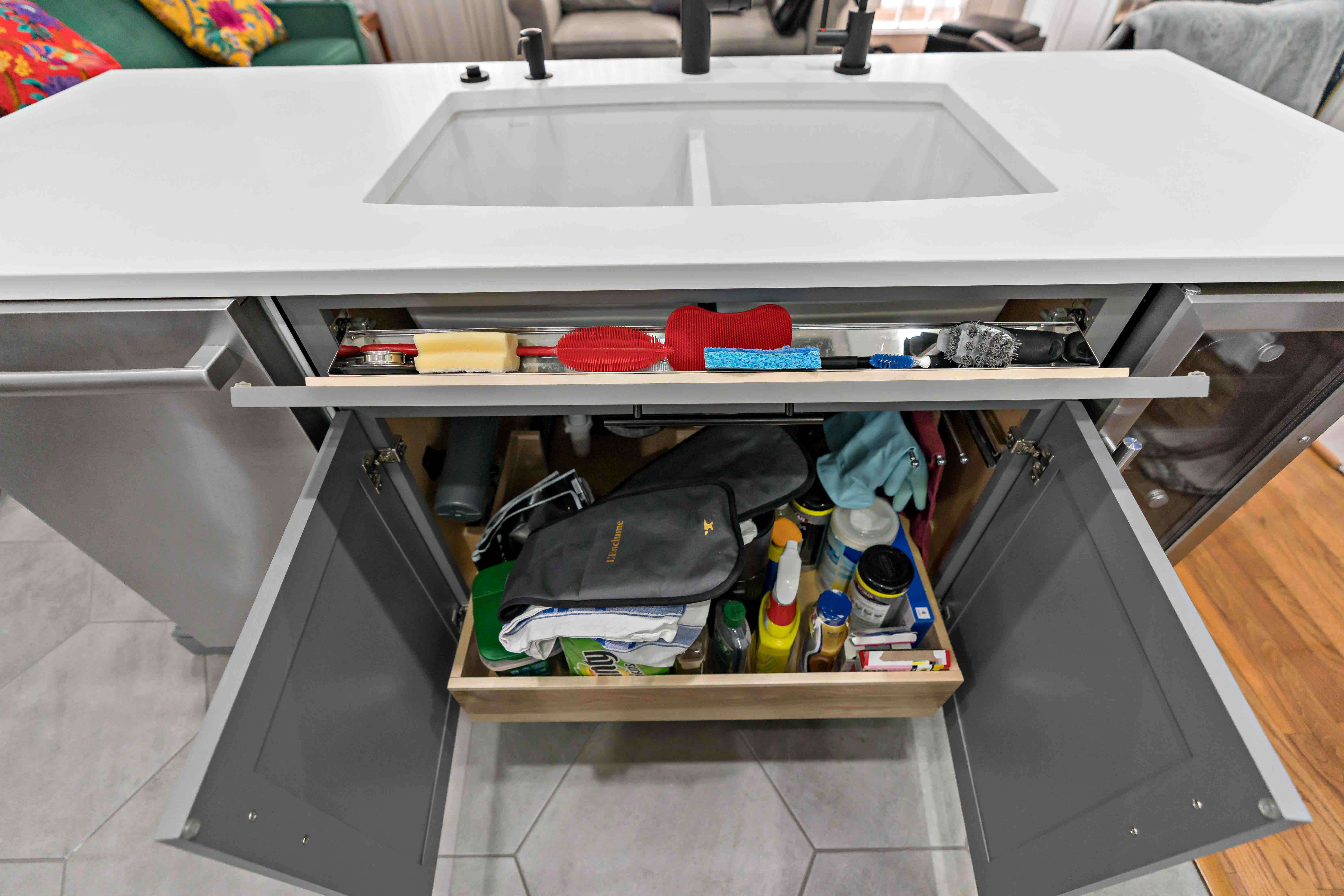 Under the kitchen sink organization and pull-out drawer