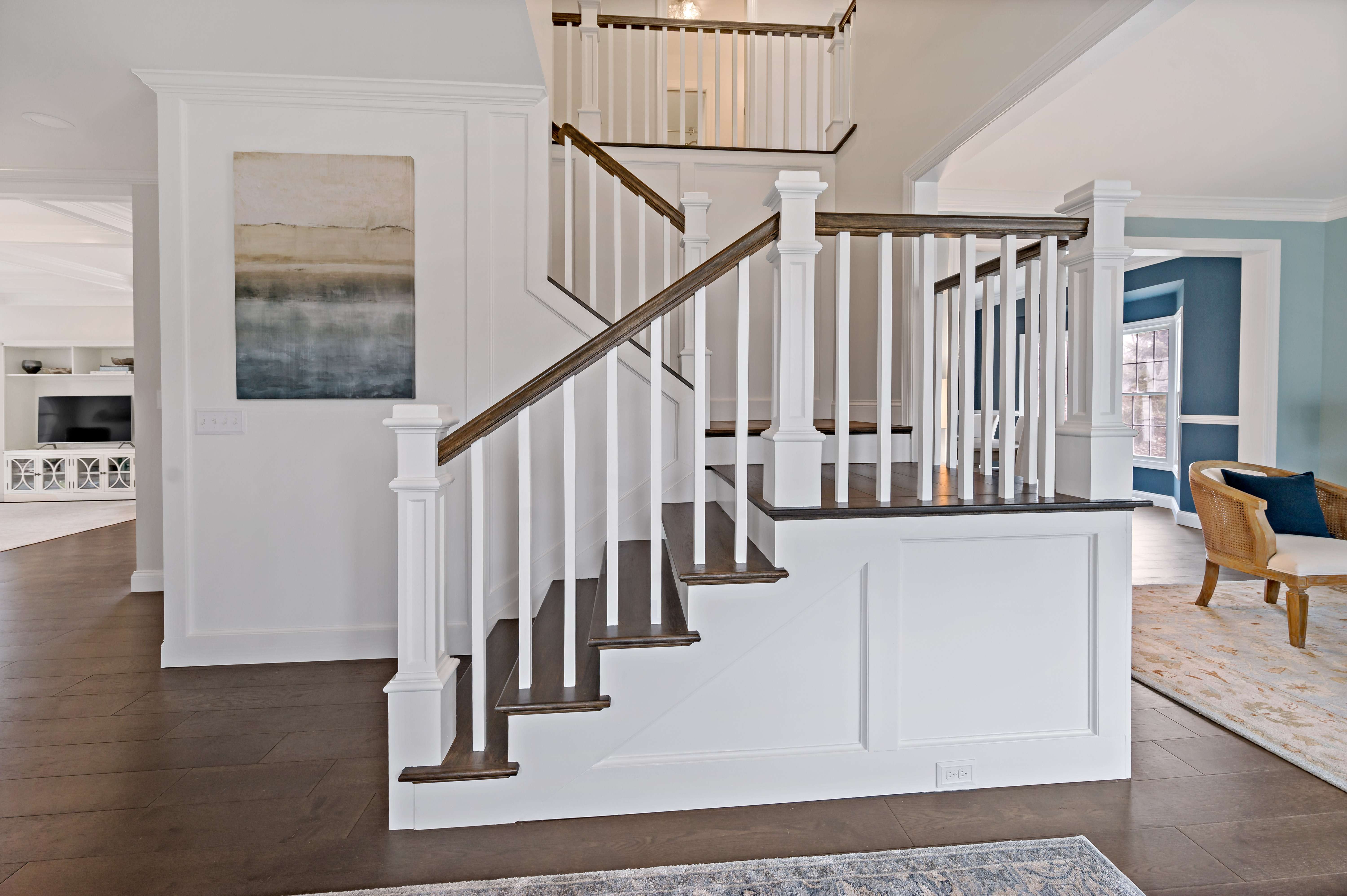 Stairwell in foyer with landing