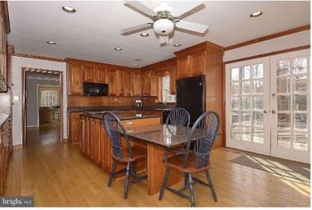 Brown wood kitchen before a remodel