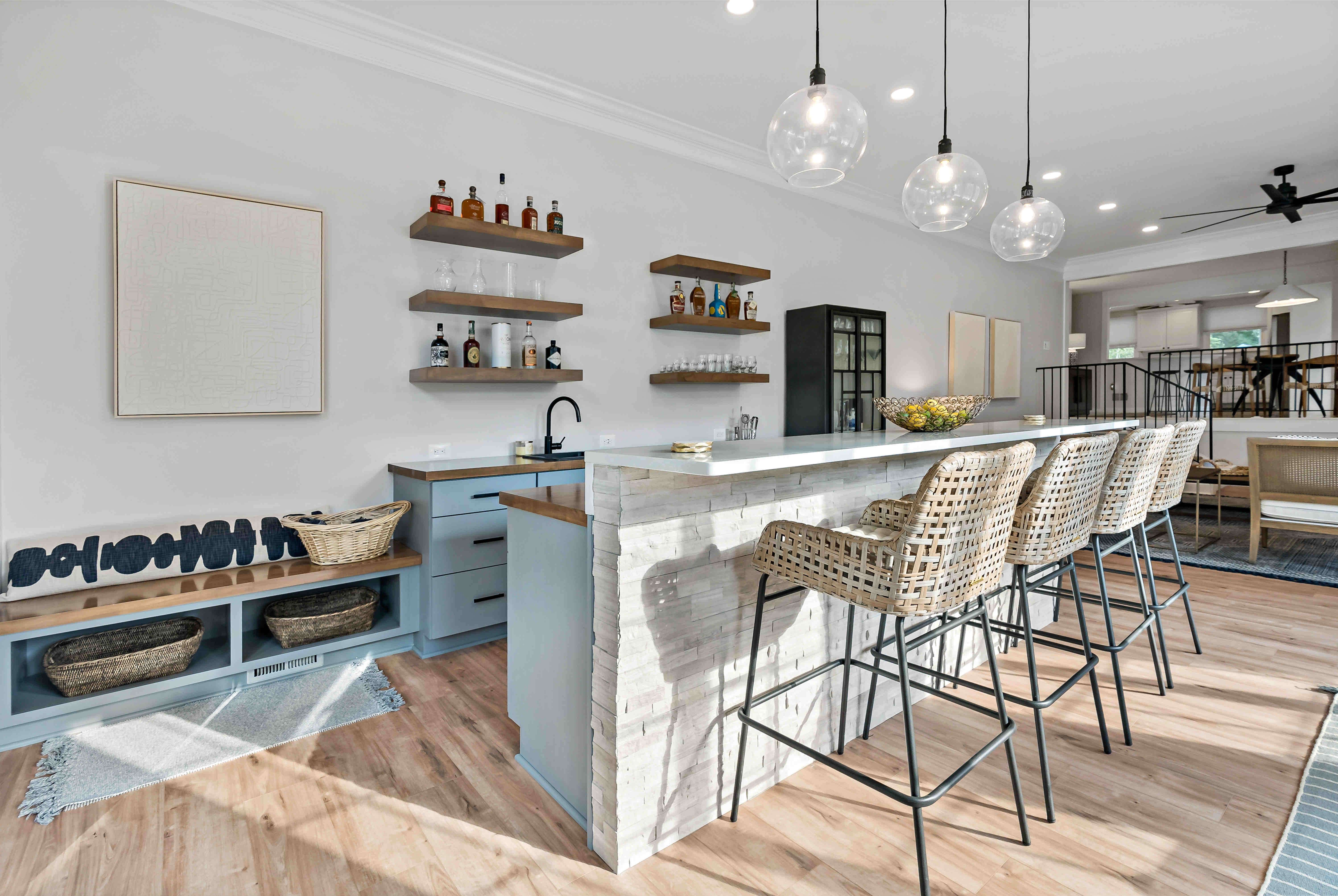 Open bar with floating shelves for drinks