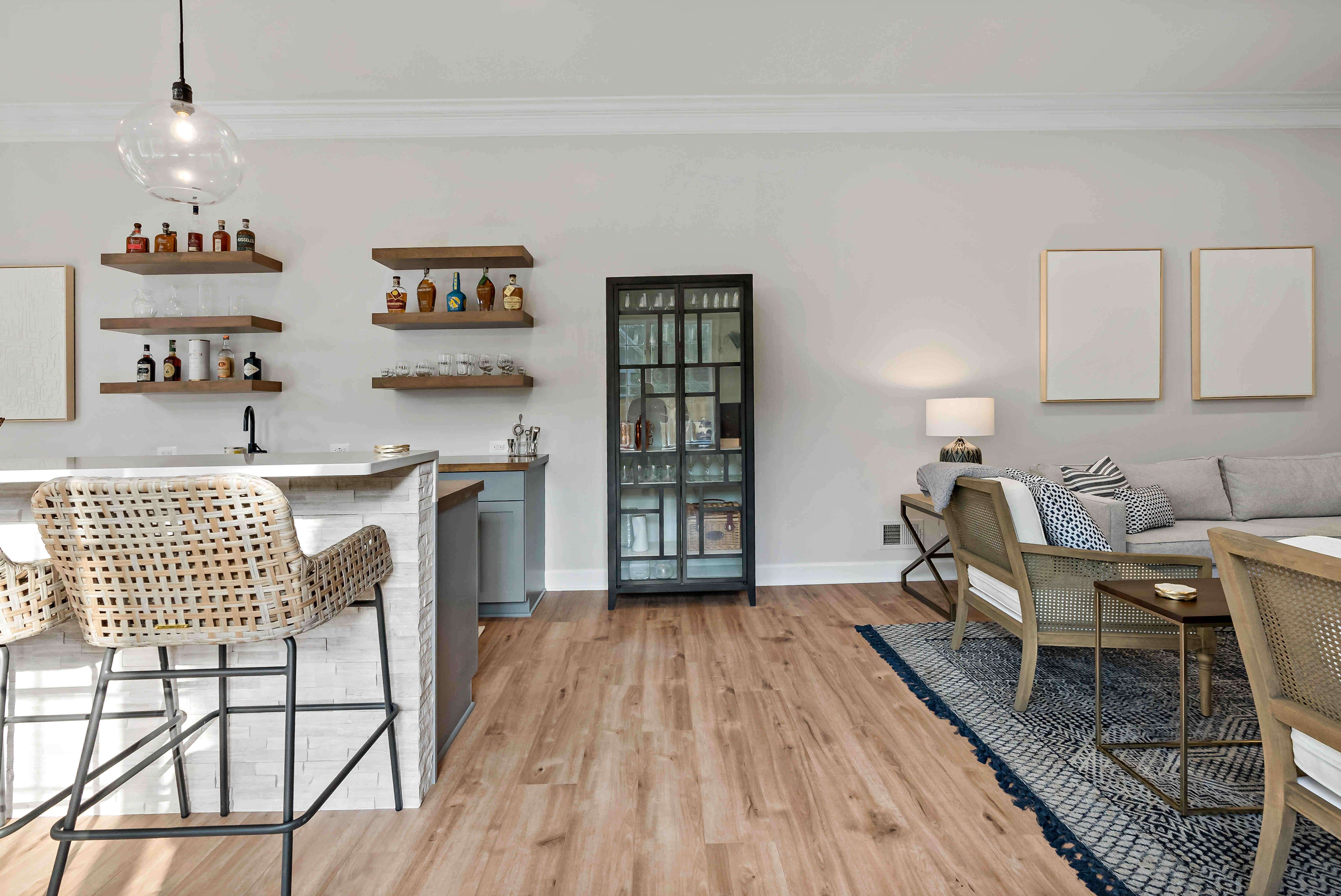 Wood flooring in bar area with drink organization shelves