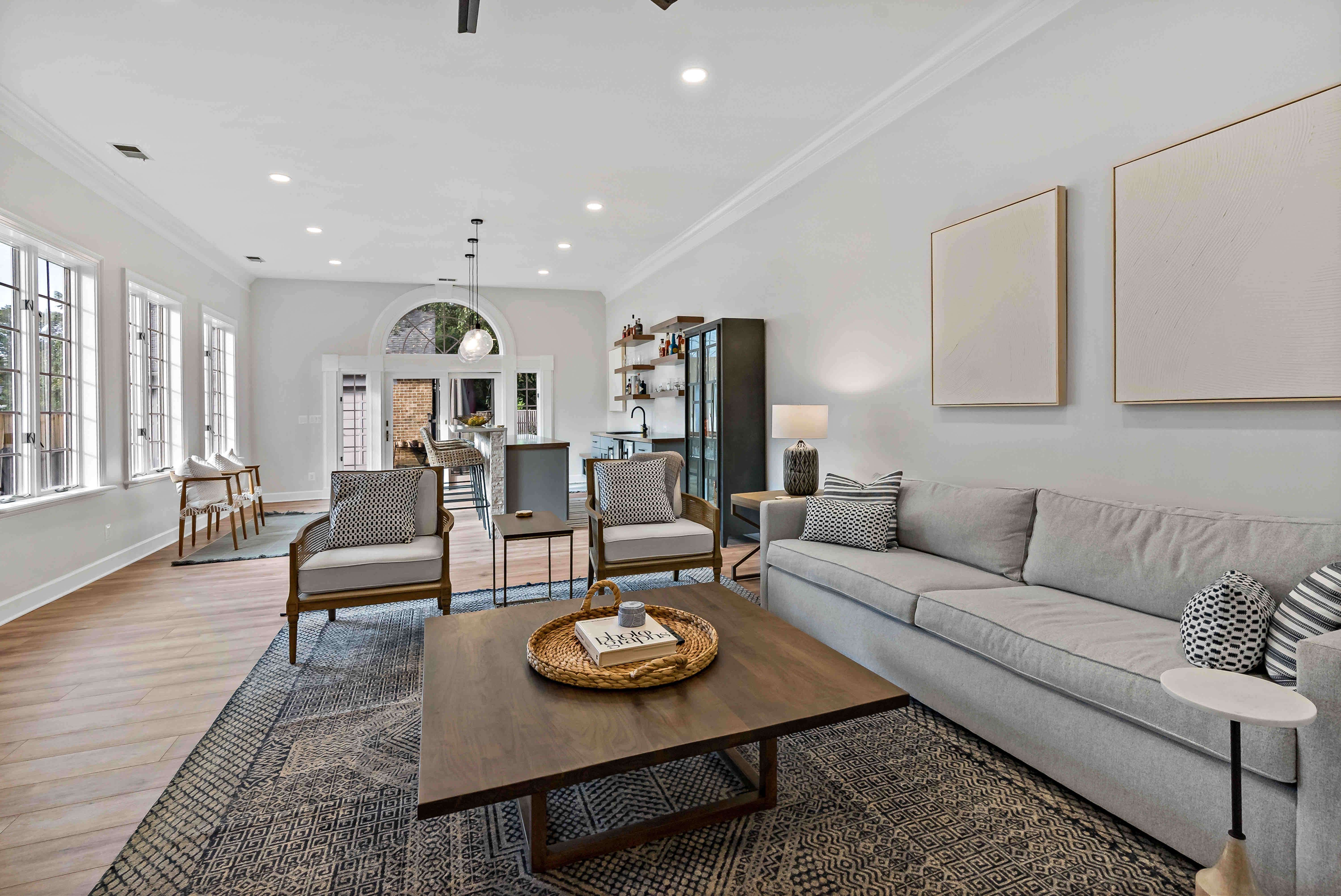 Living room with wood flooring and area rug