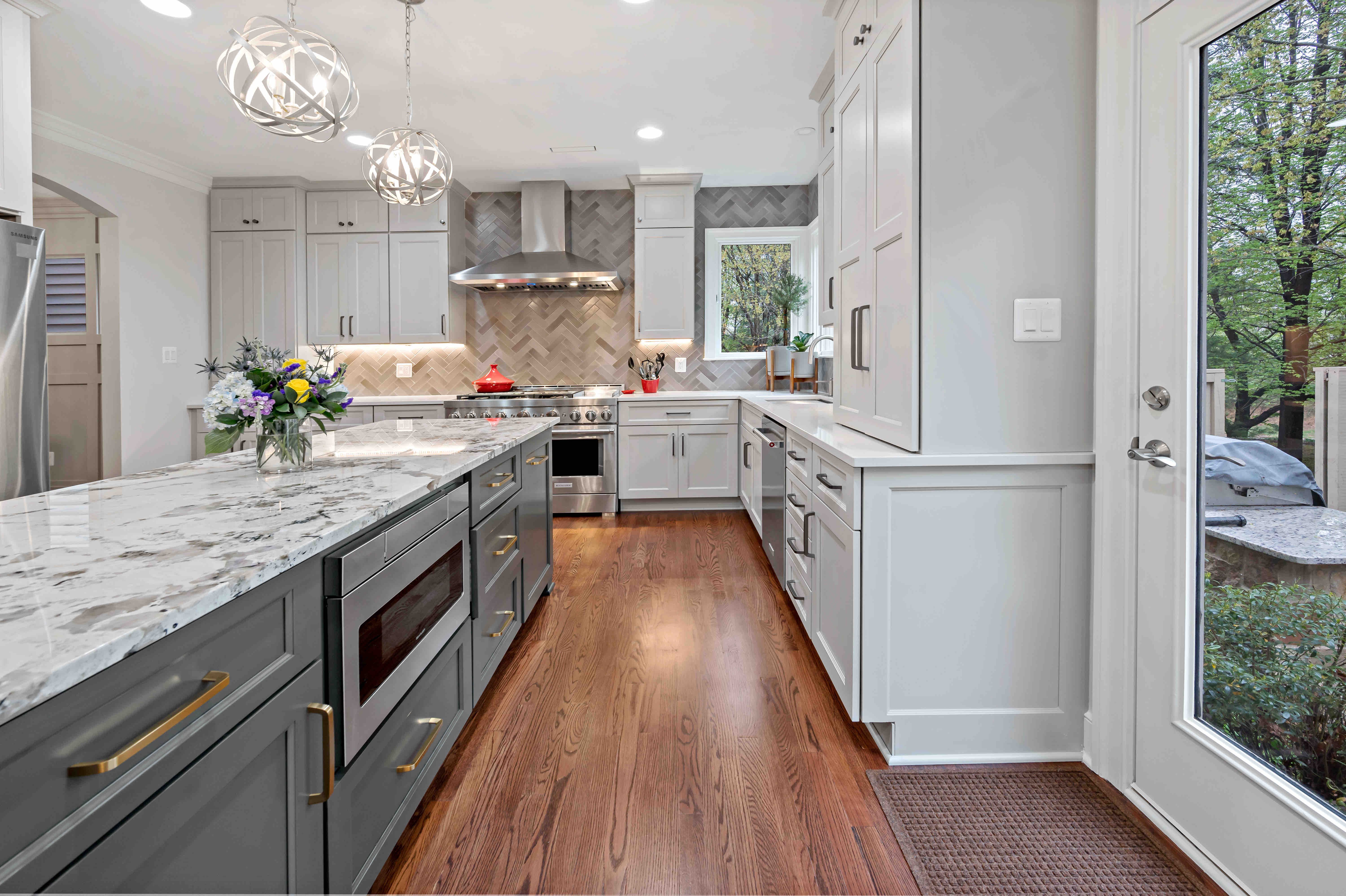 Long kitchen island and door to outside