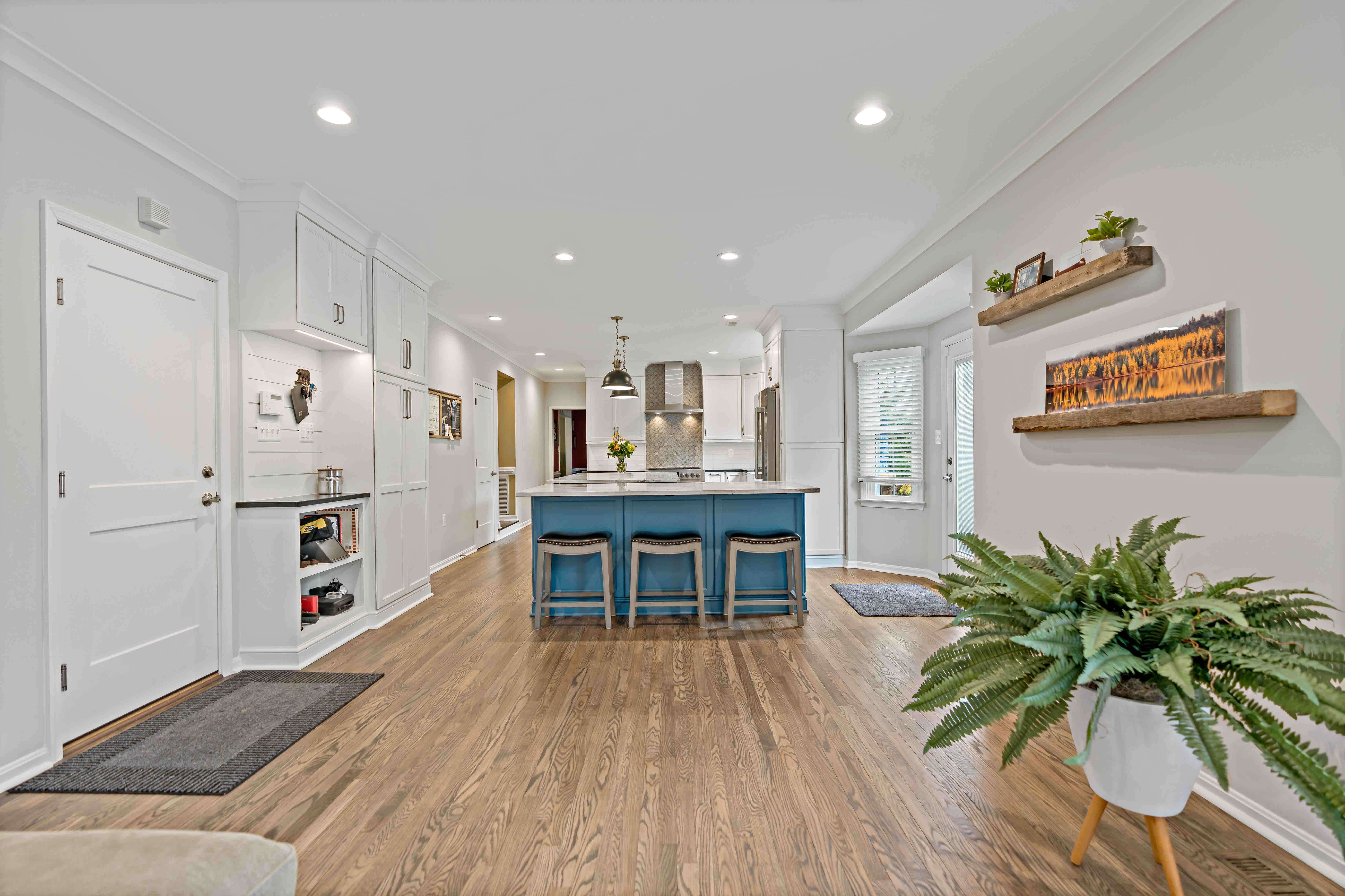 Open and spacious kitchen with floating shelves