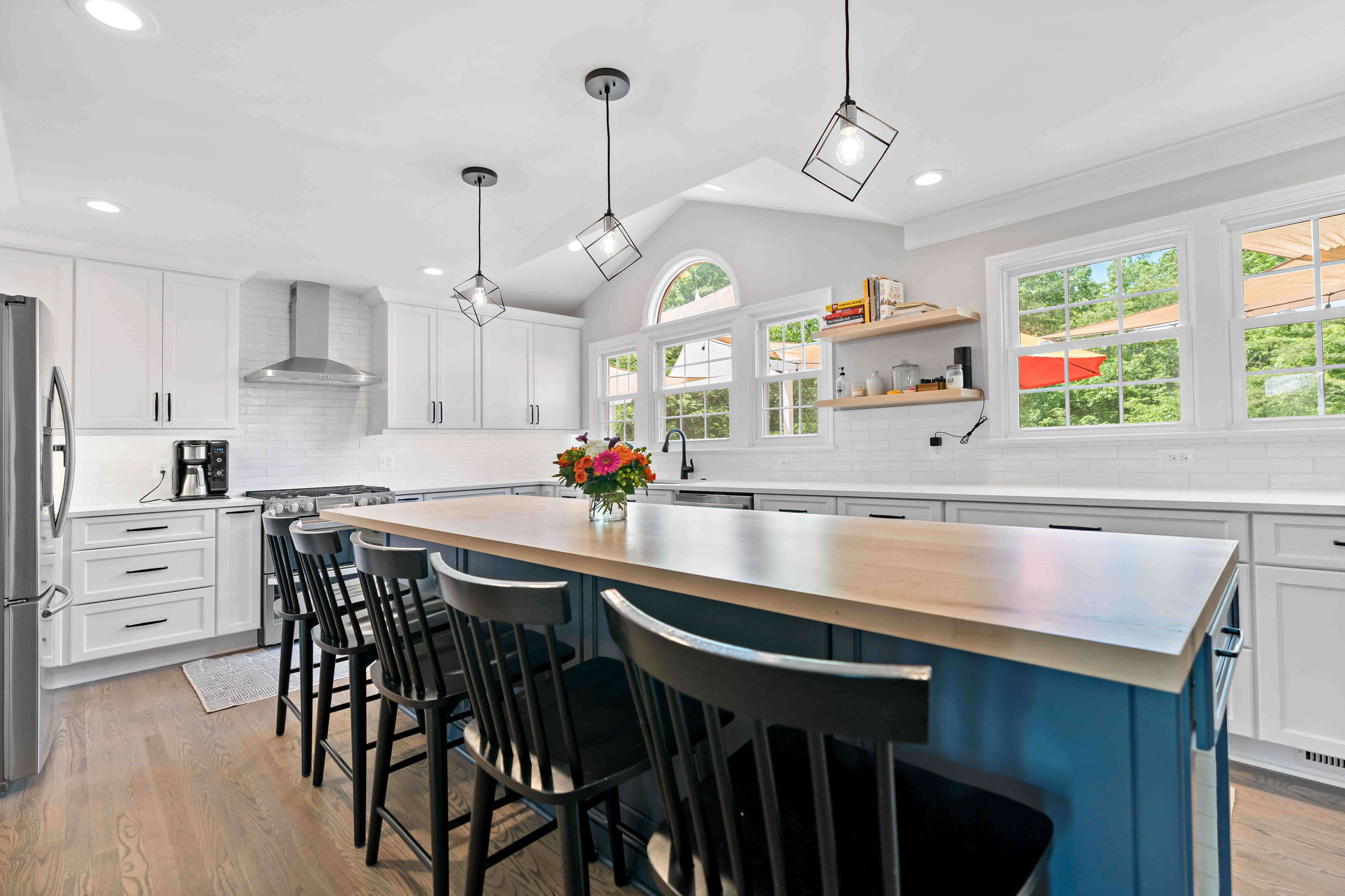 Long blue kitchen island with seating