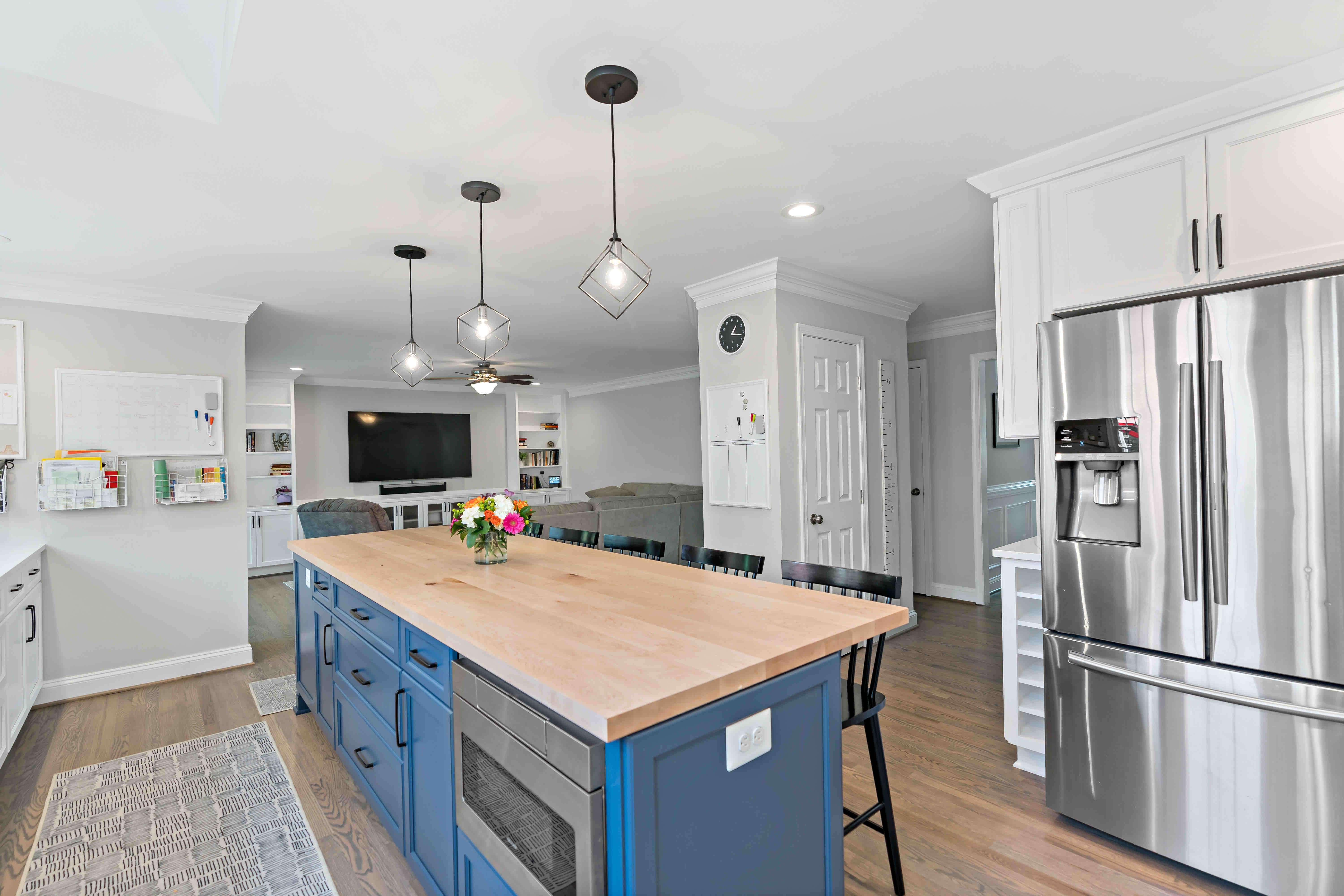 Microwave in blue kitchen island