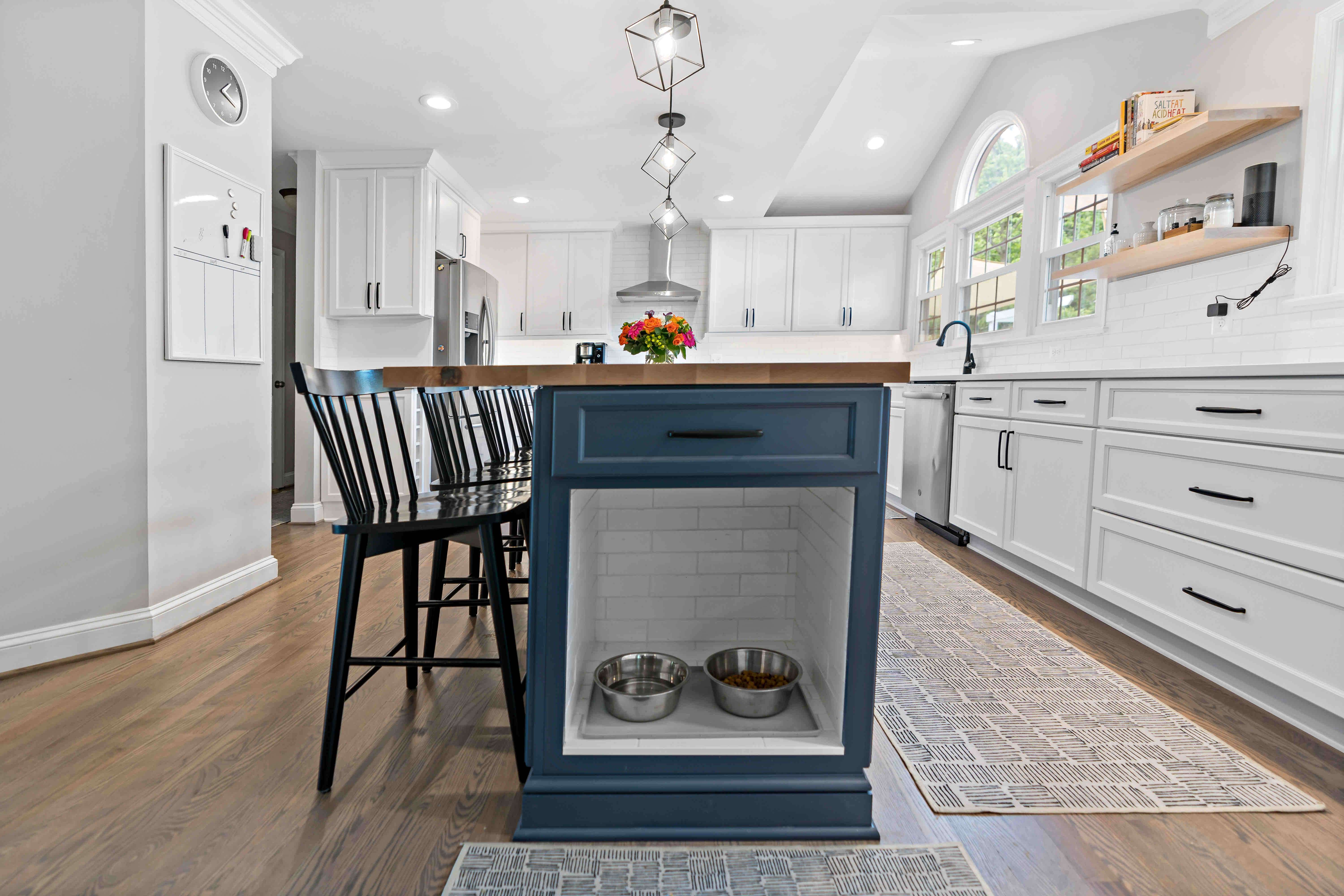 Dog food and water bowl station built into kitchen island