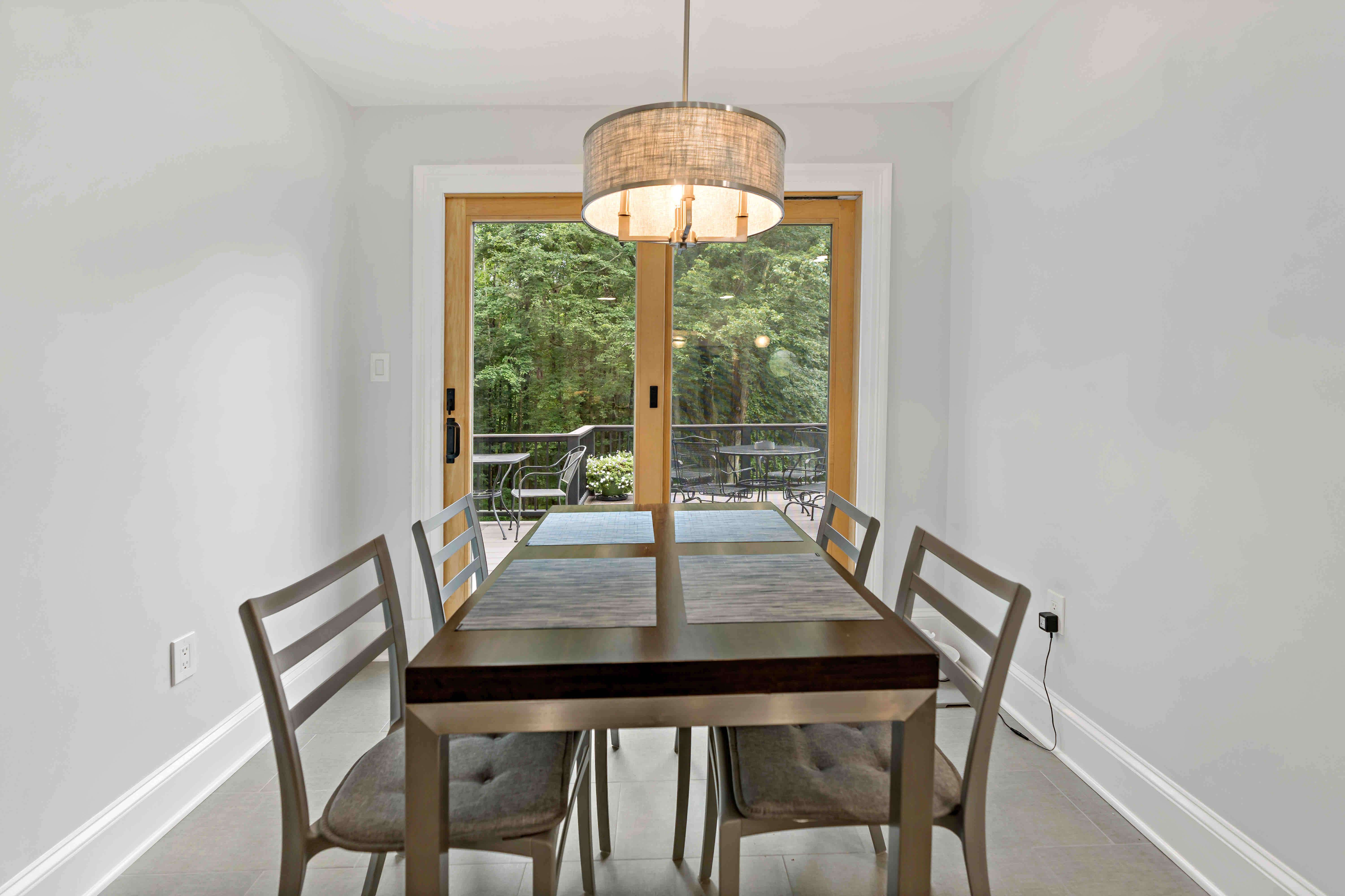 Kitchen table with round pendant lighting
