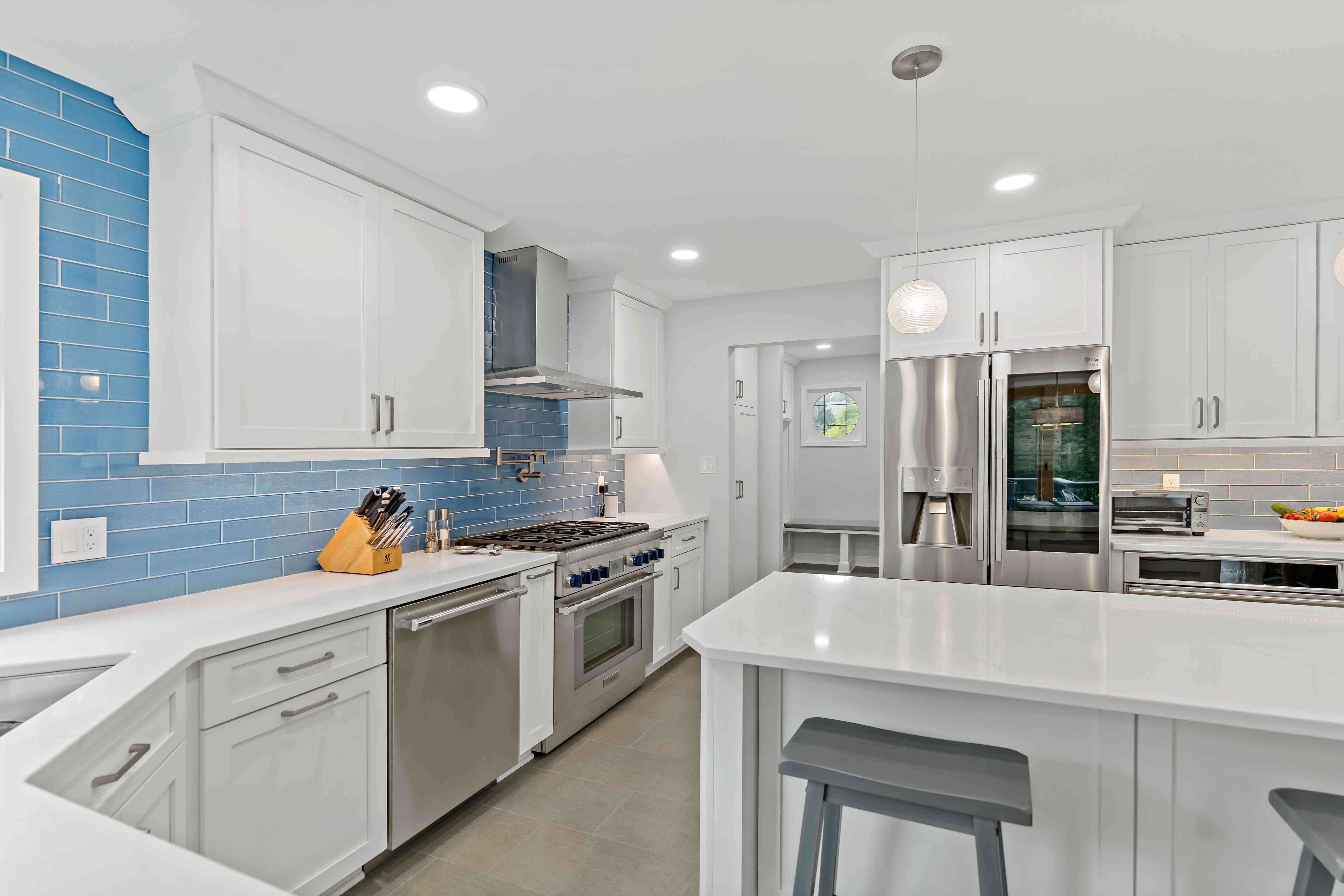White kitchen with island seating