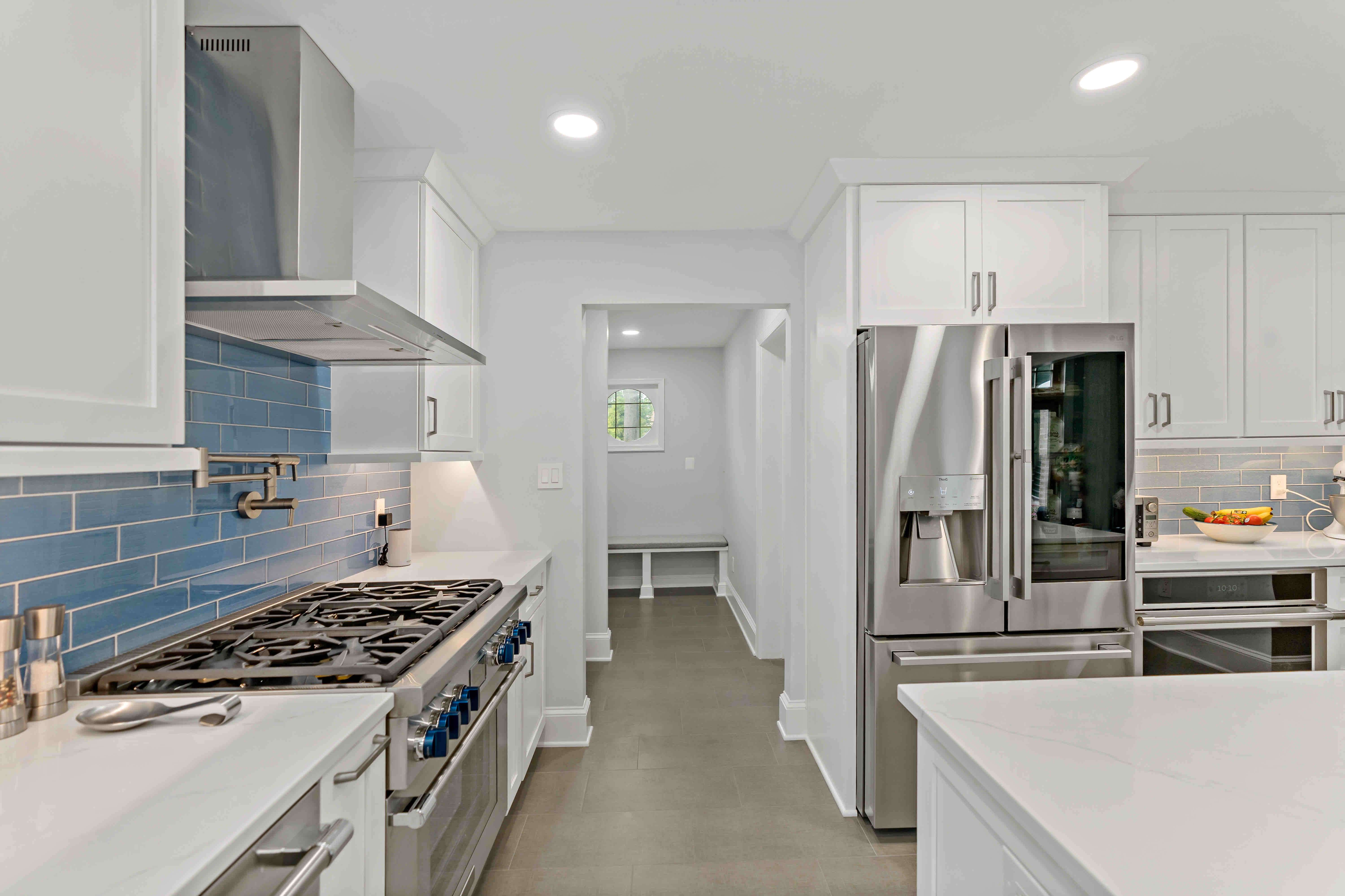 Beige floor in white kitchen