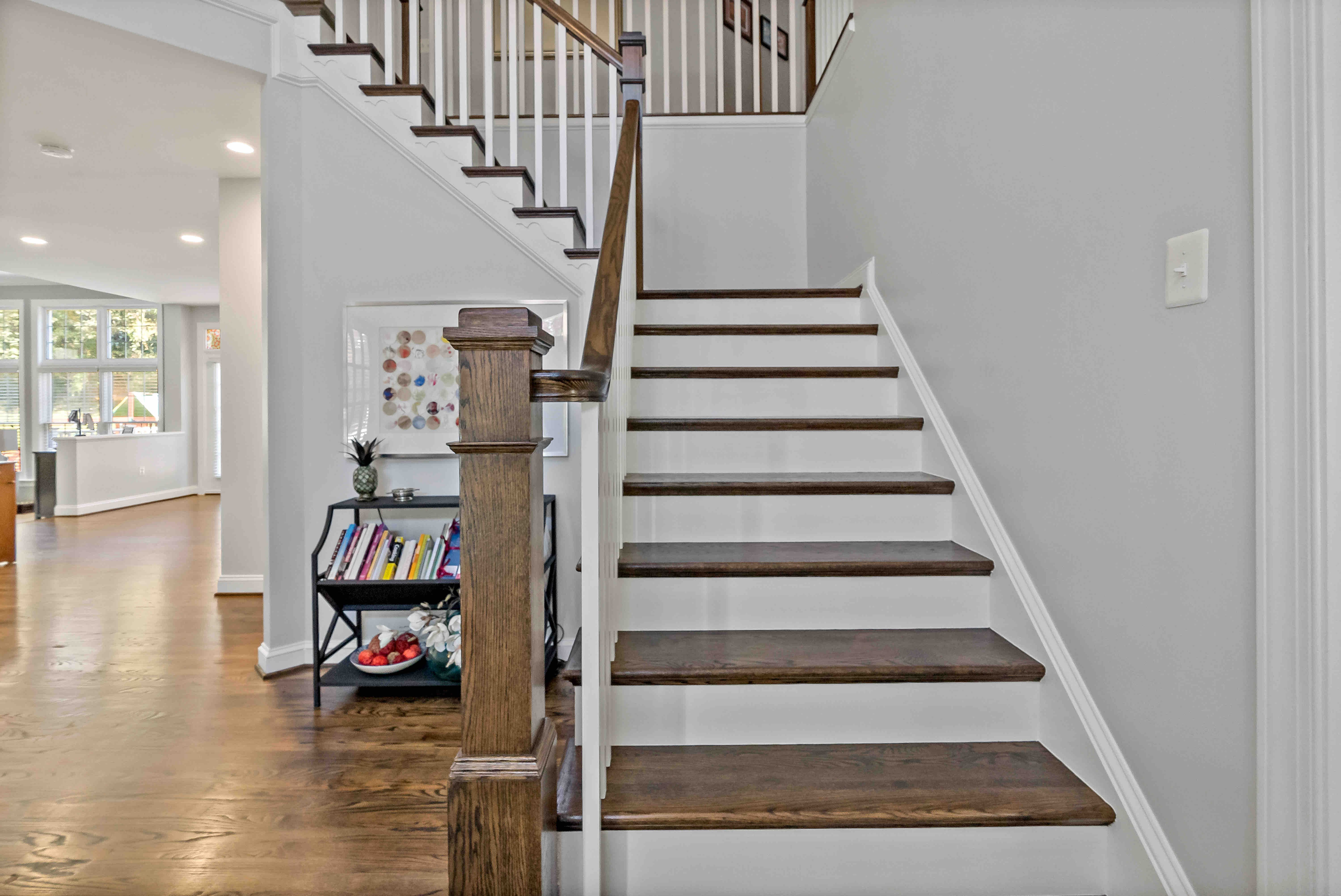 Staircase in foyer leading upstairs