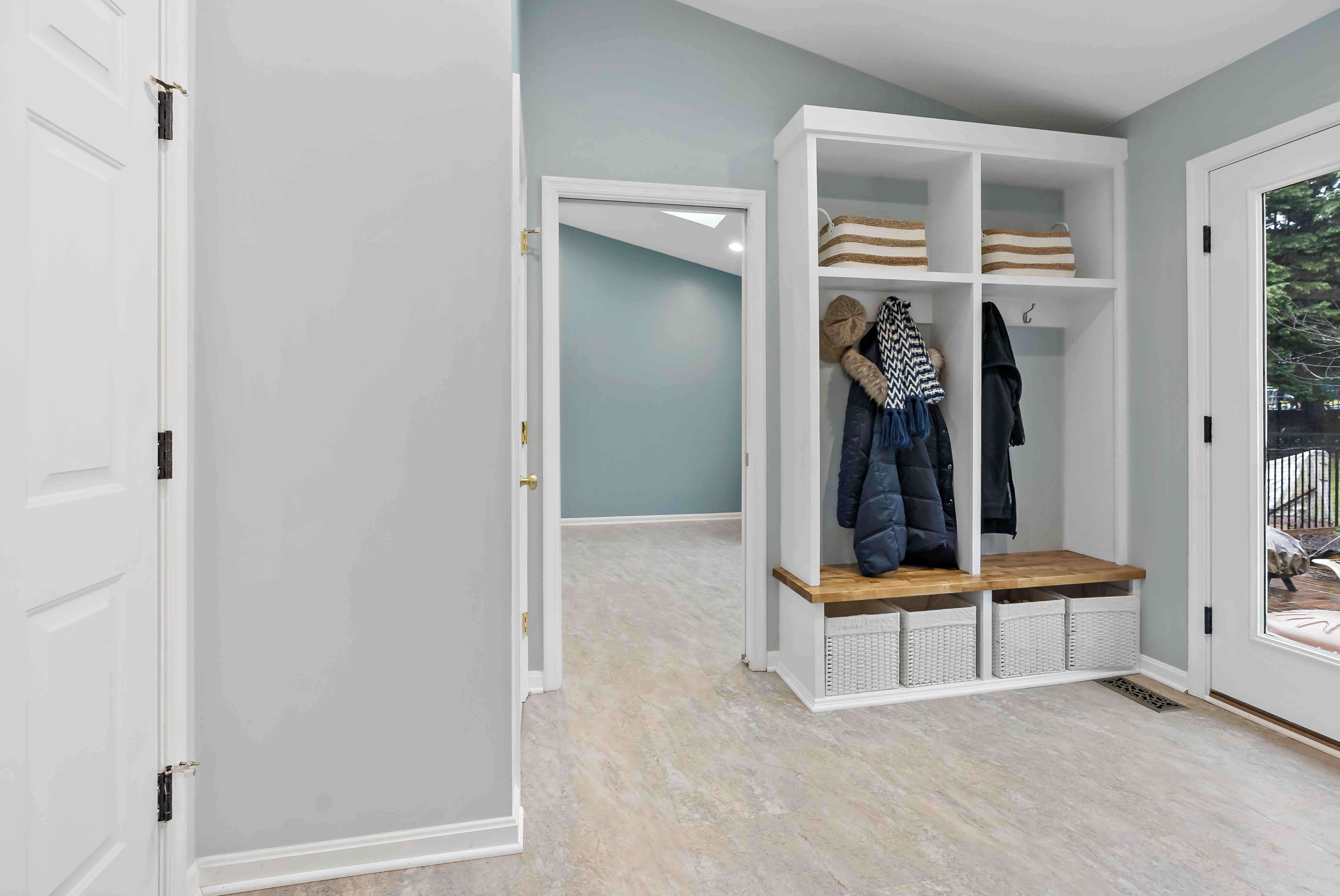 Mudroom with hooks and cubbies