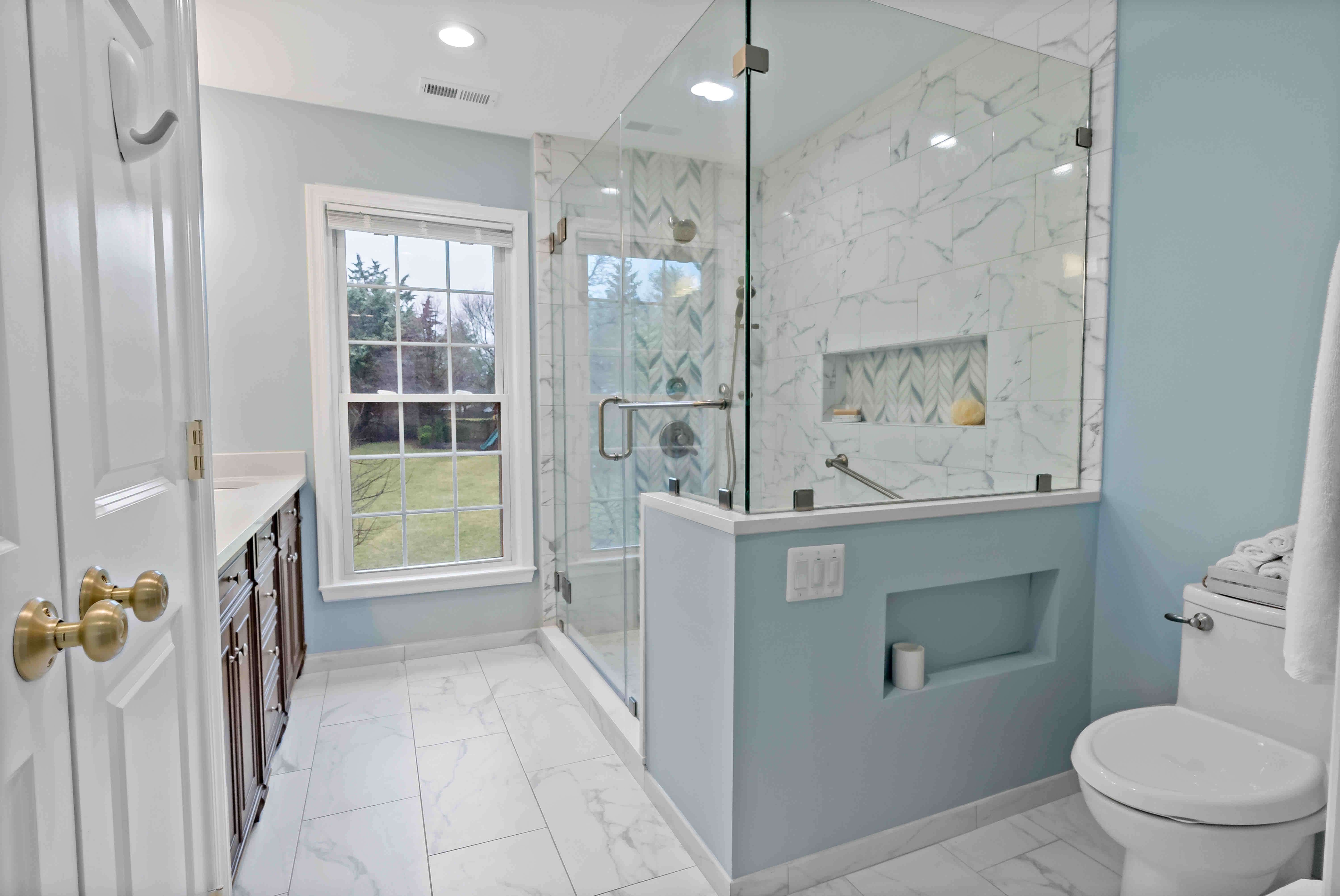 Glass walls and door in stand-up shower