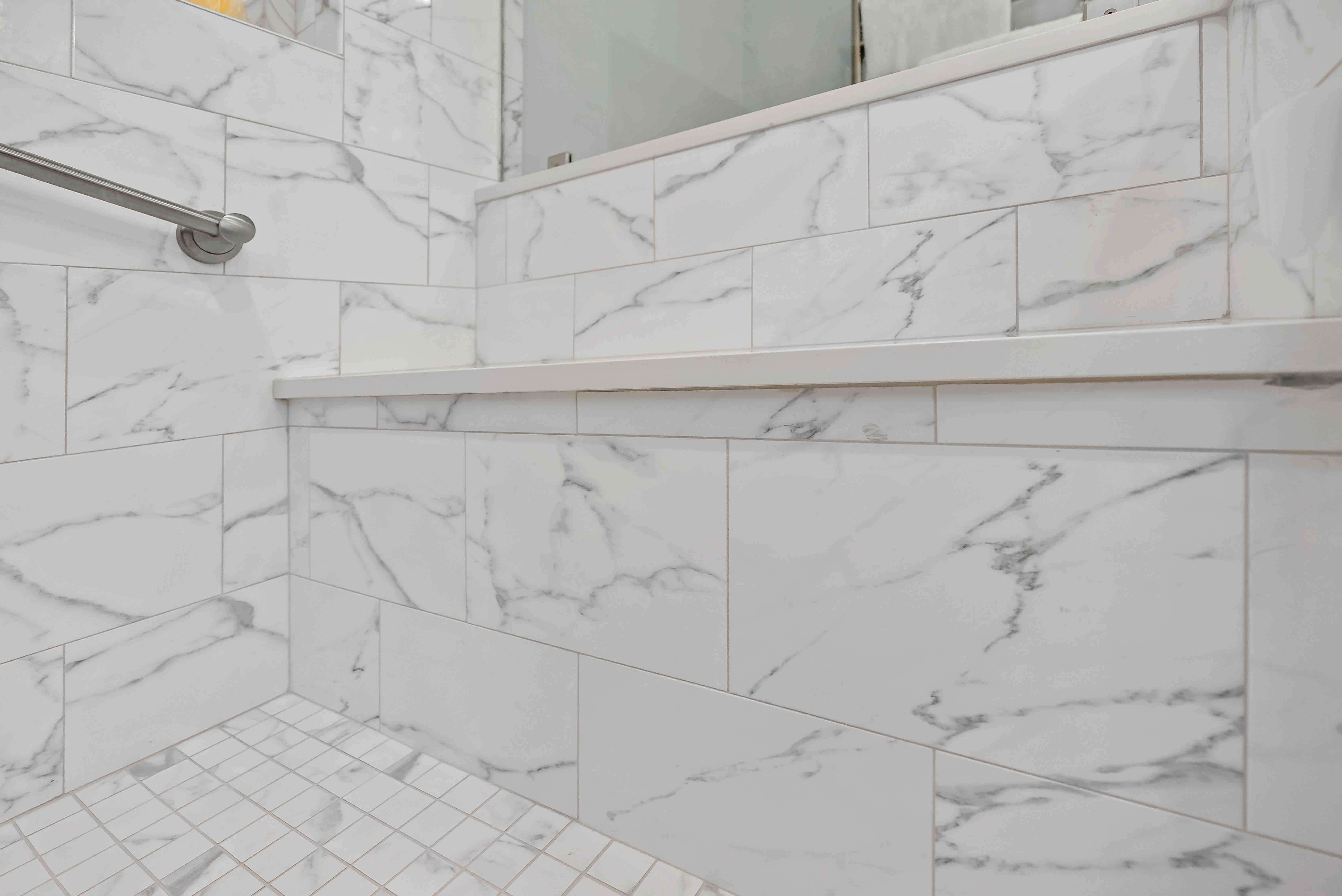 White with grey marble shower wall