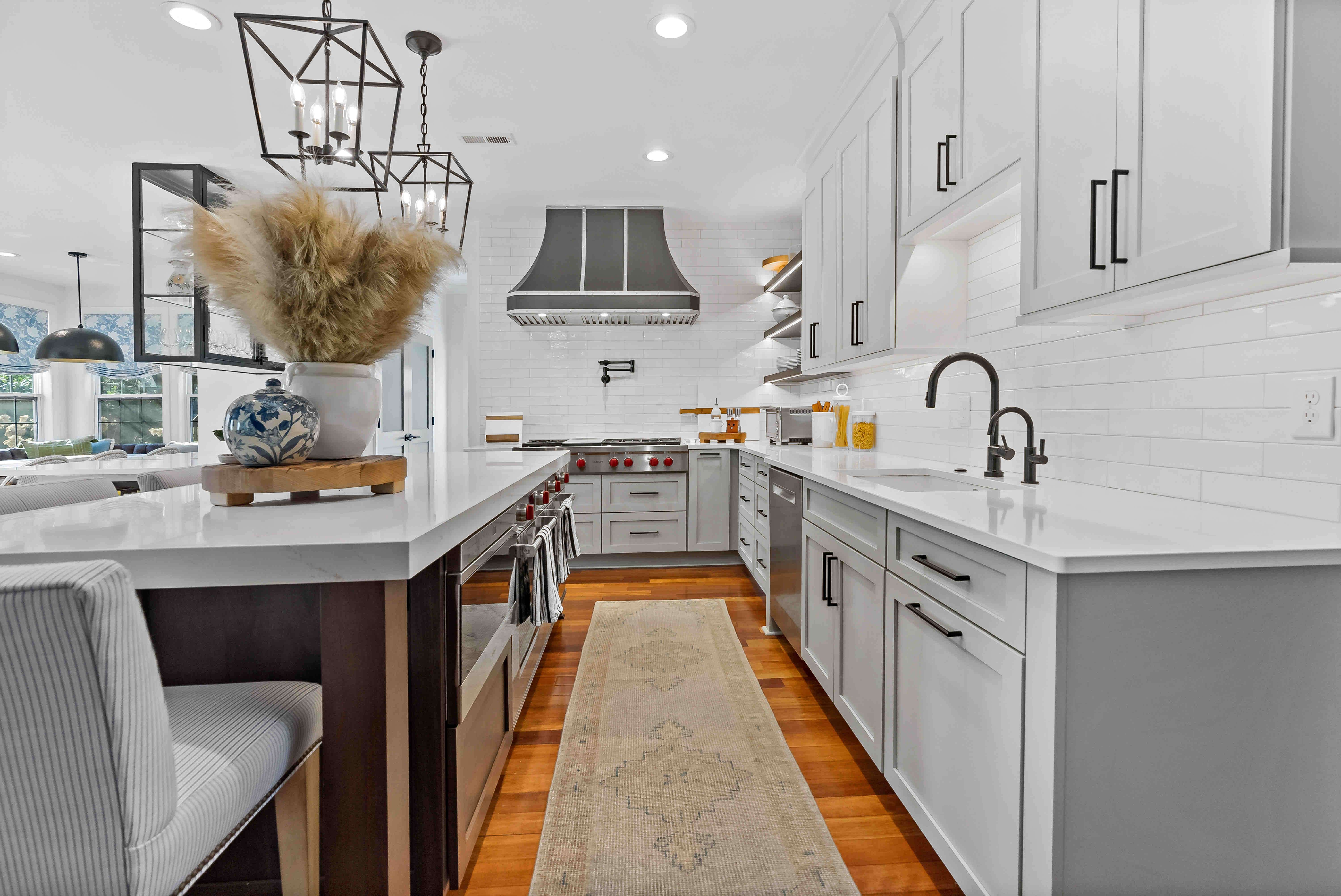 Black fixtures in white kitchen