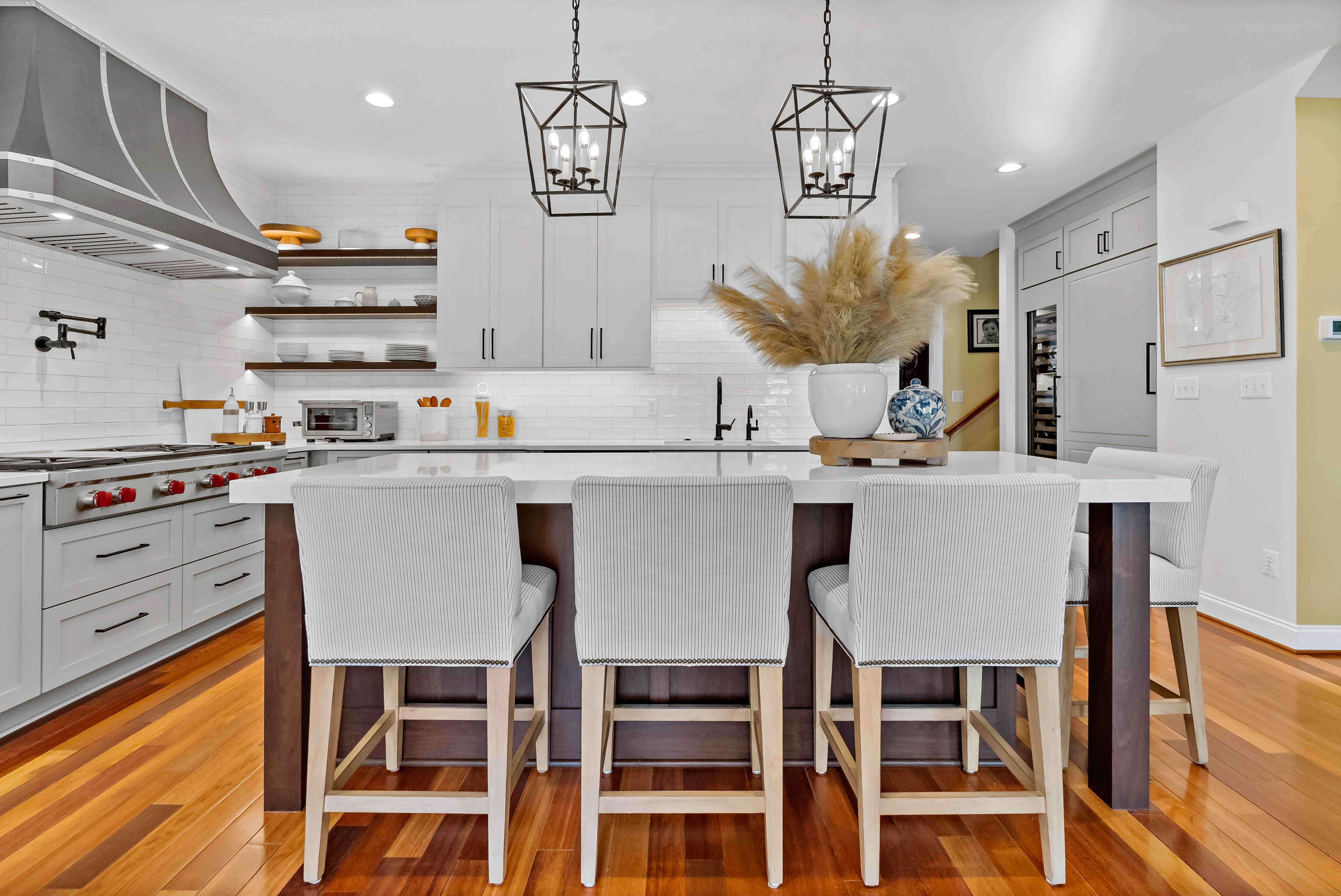 Kitchen island with pendant lighting above