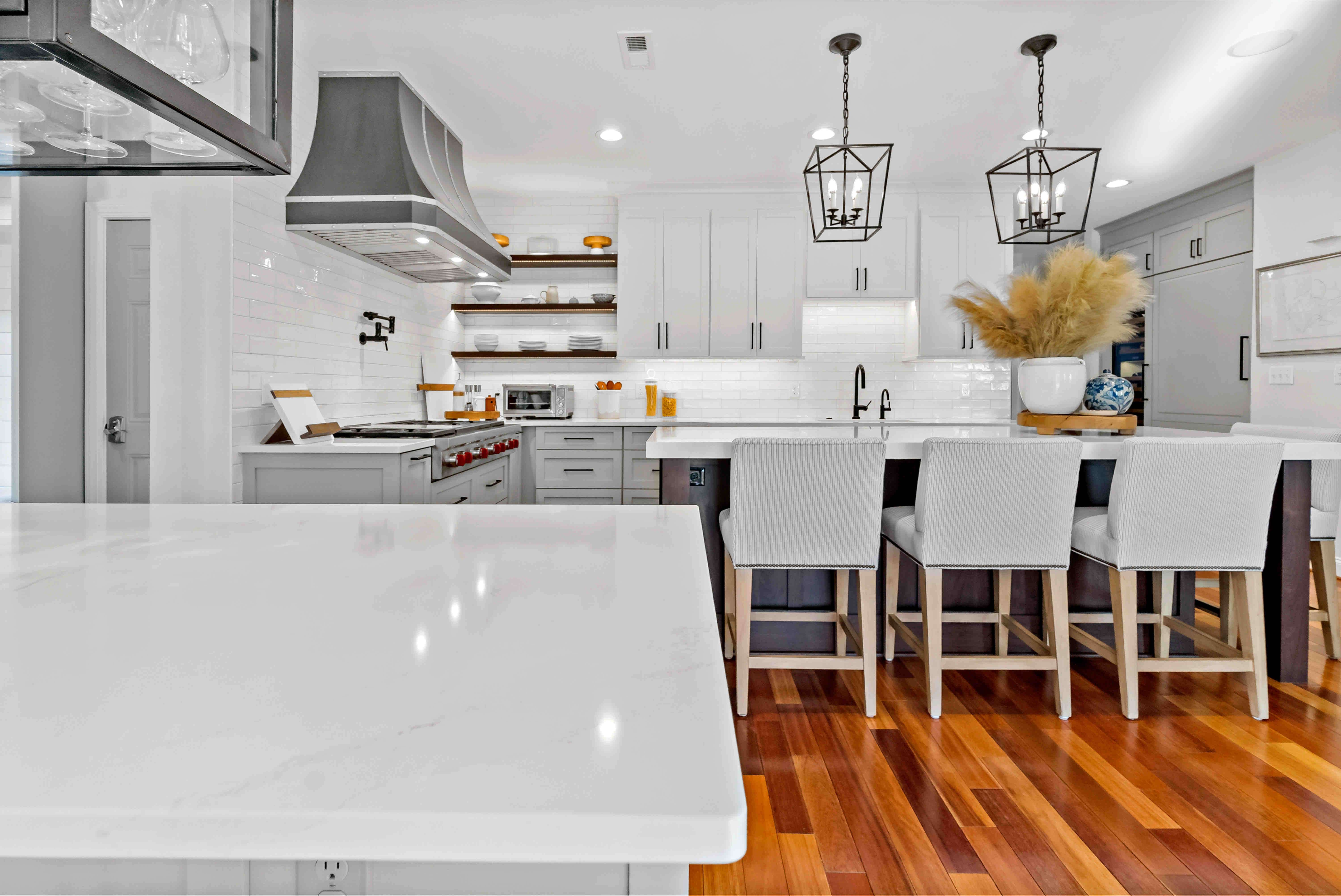 Hard wood flooring in modern white kitchen