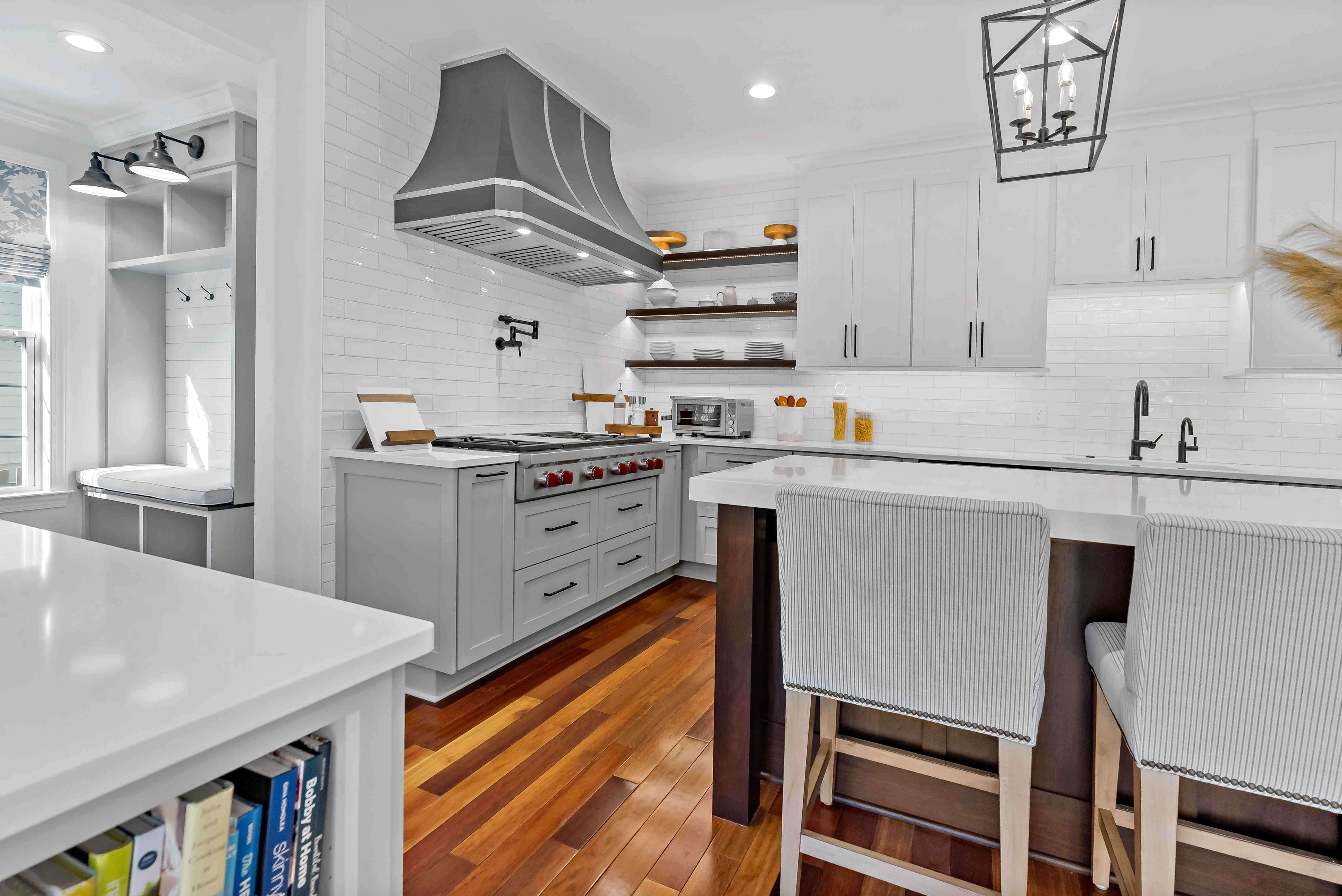 White countertops and cabinets in kitchen