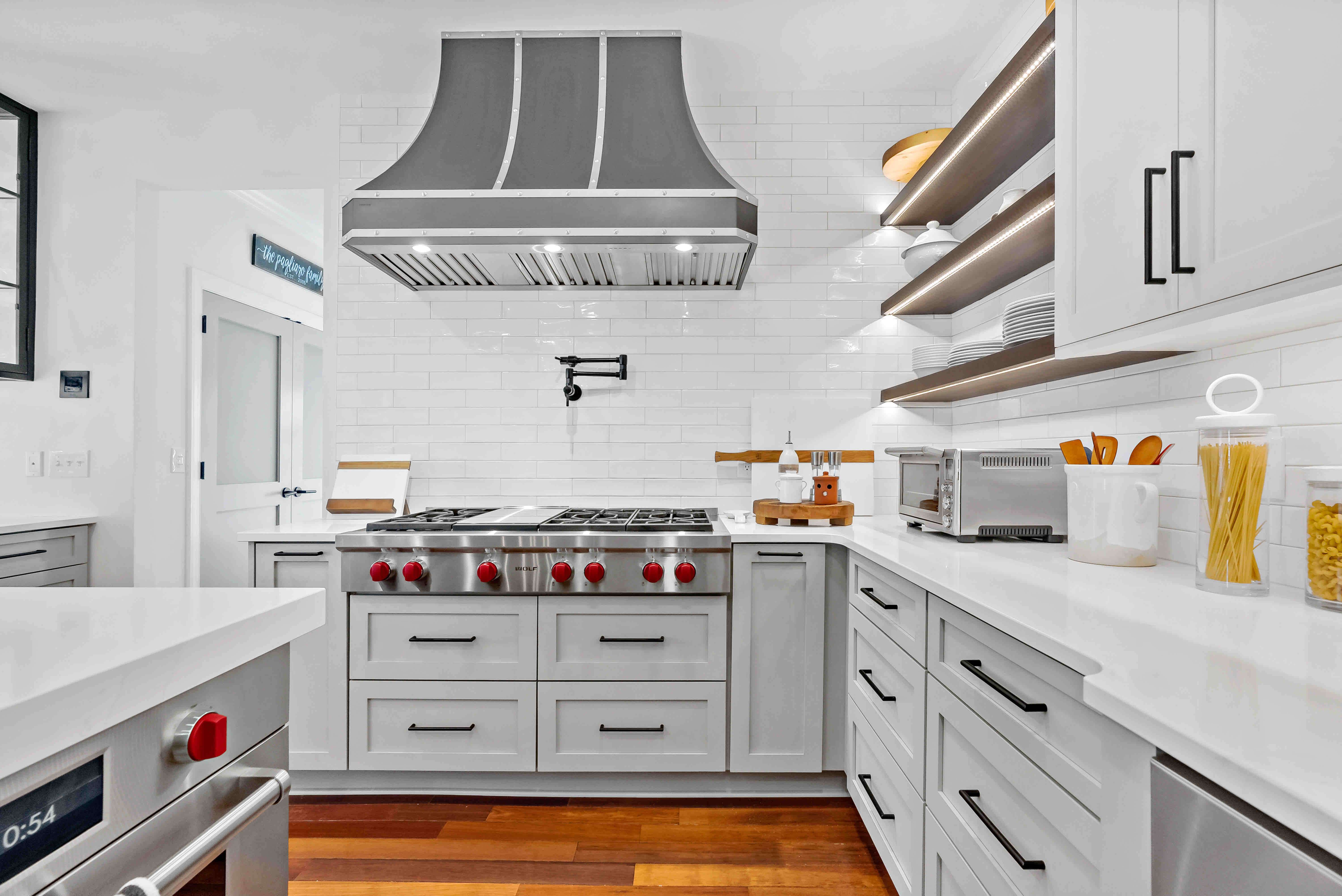 White drawers in kitchen with black handles