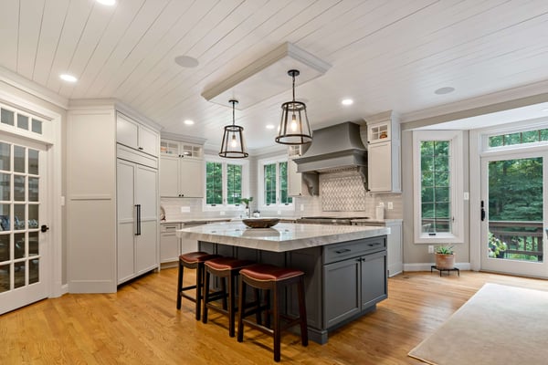 Shiplap ceiling in modern country style kitchen with island