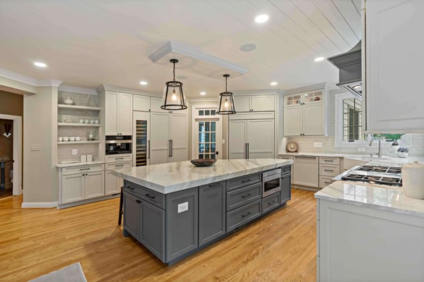 Farmhouse kitchen with floating shelves and hidden appliances