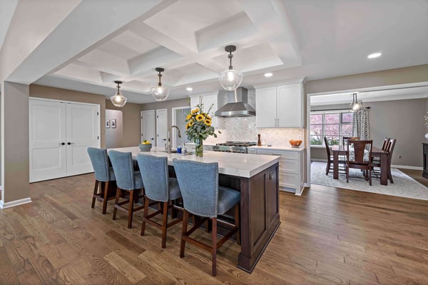 Coffered ceiling in open concept kitchen with island seating