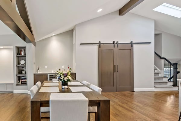 Brown sliding barn door for pantry in modern Vienna kitchen