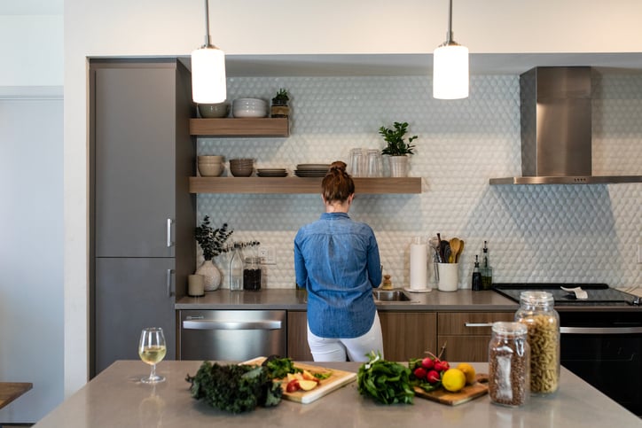Woman prepping food in a spacious kitchen