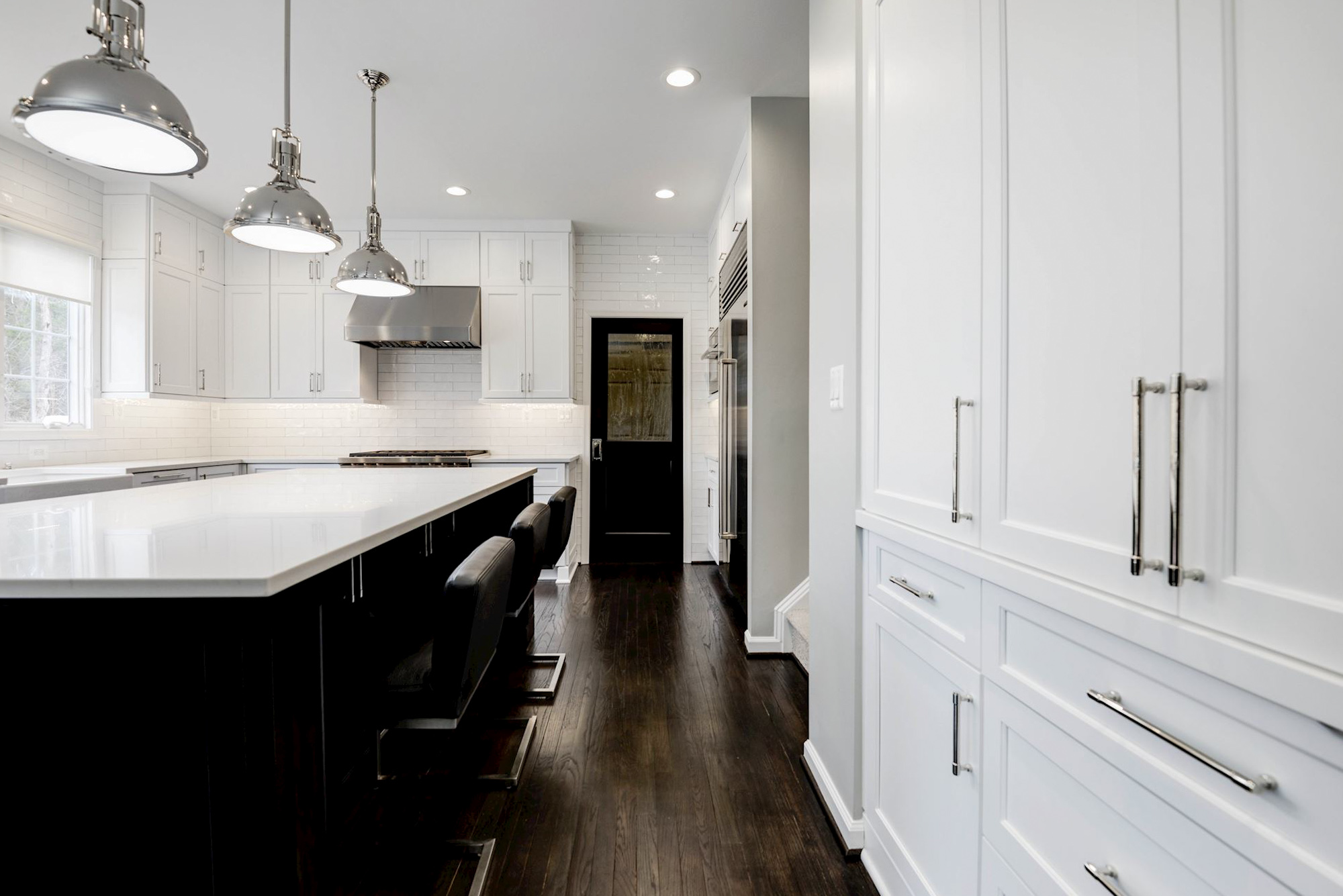 White cabinets with silver handle fixtures