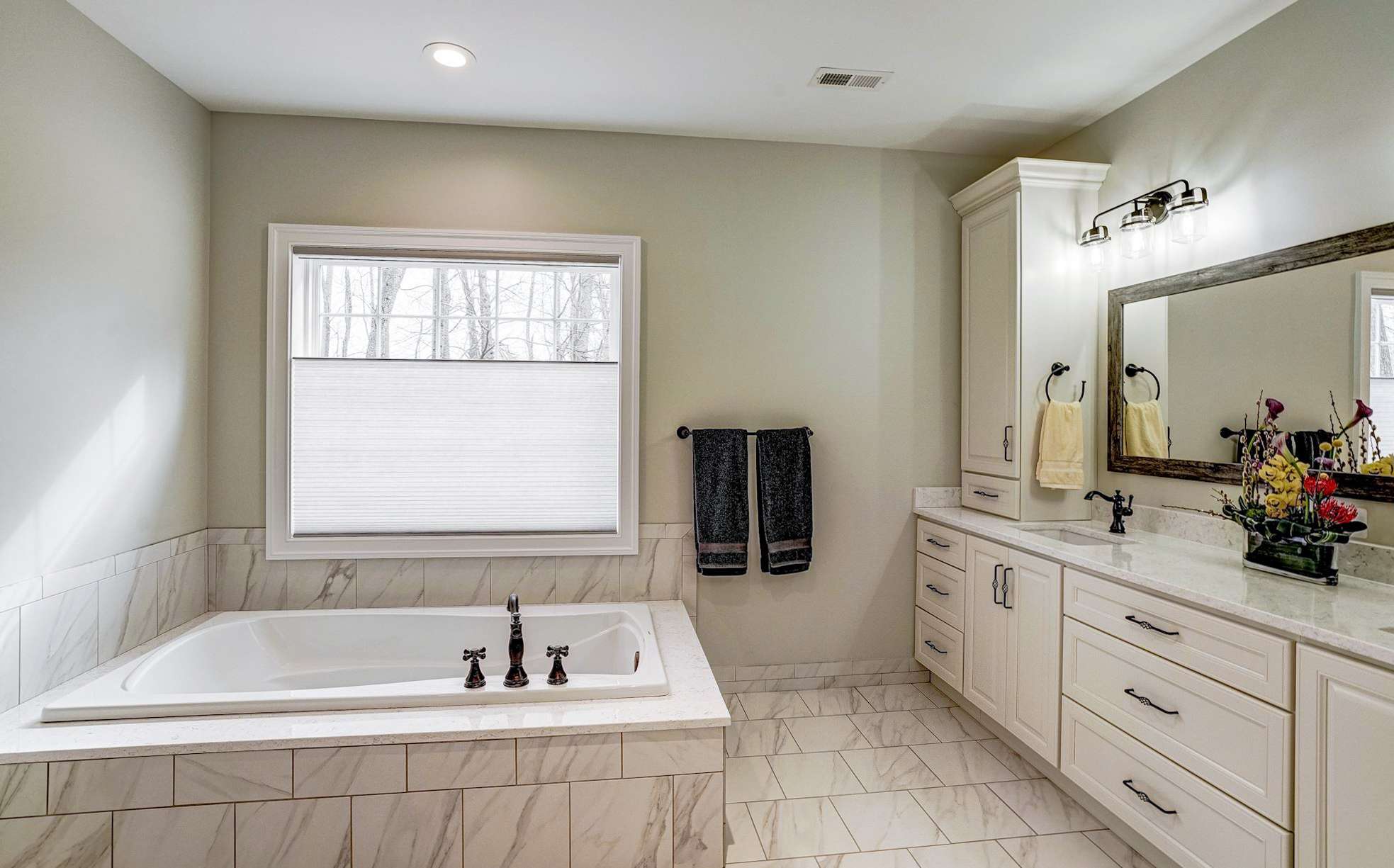 White marble floor tile and bathtub