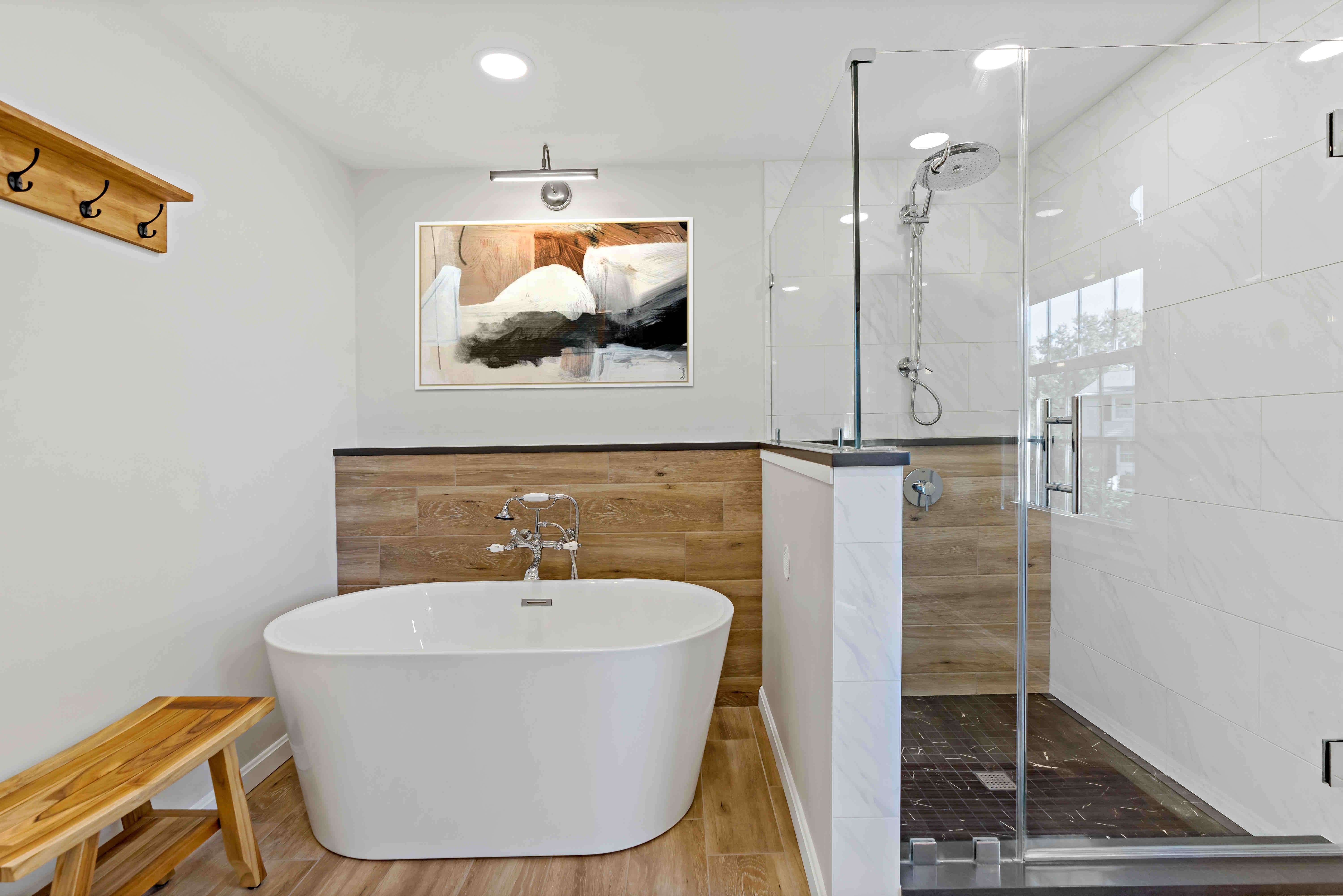 Herndon Primary Bathroom Remodel showcasing a tub and shower