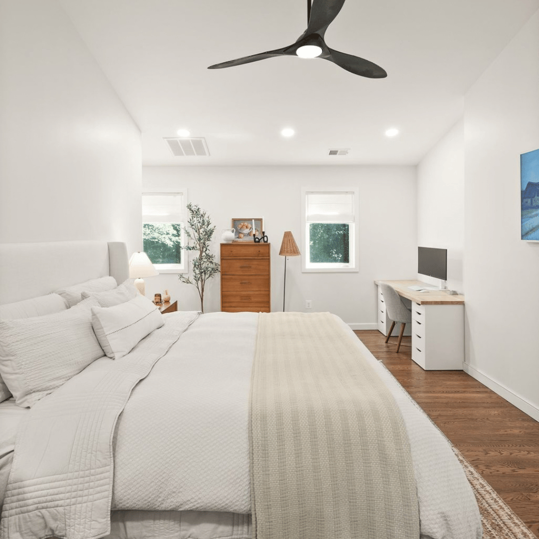 After: spacious, bright primary bedroom