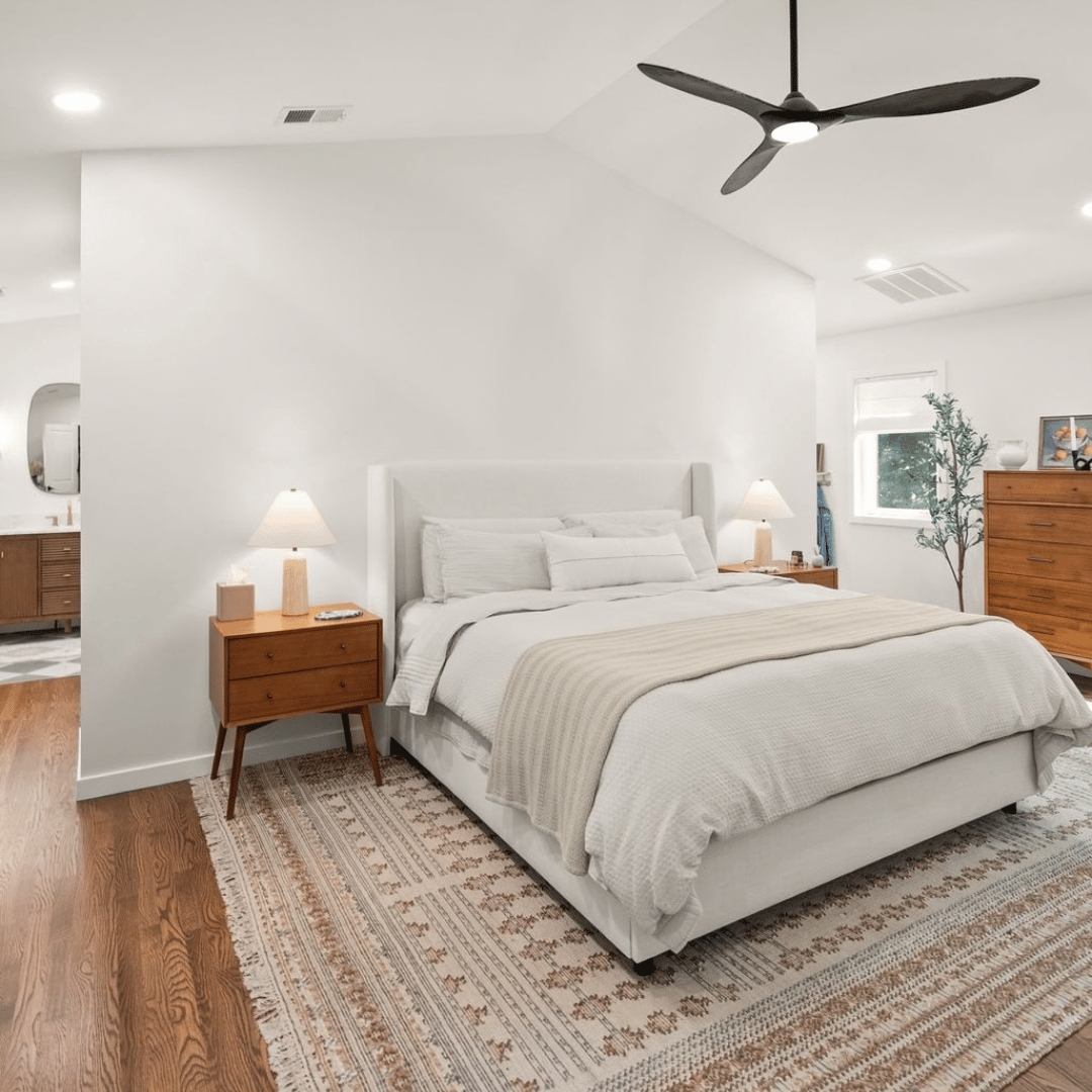 After: spacious, bright primary bedroom
