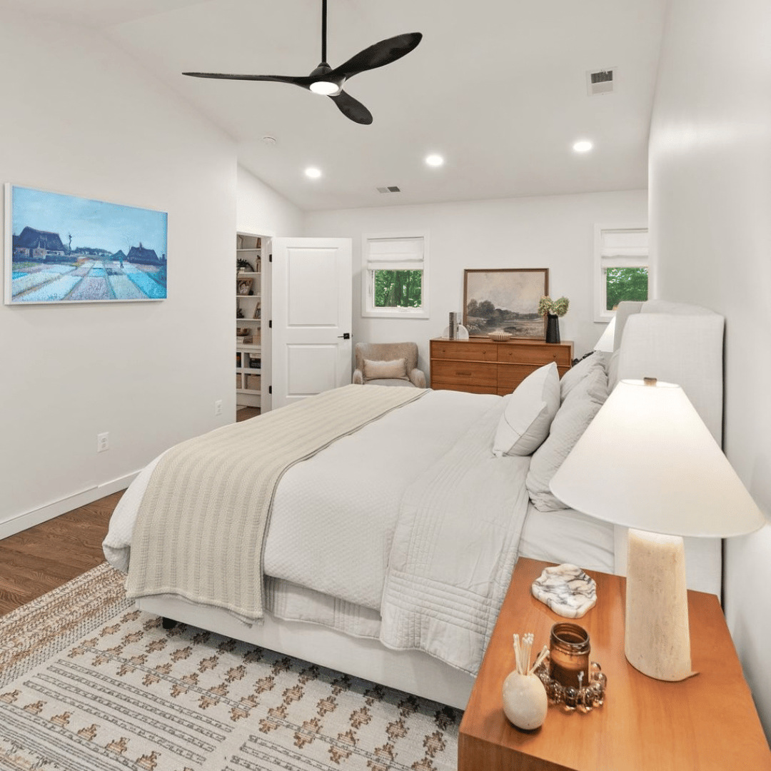 After: spacious, bright primary bedroom
